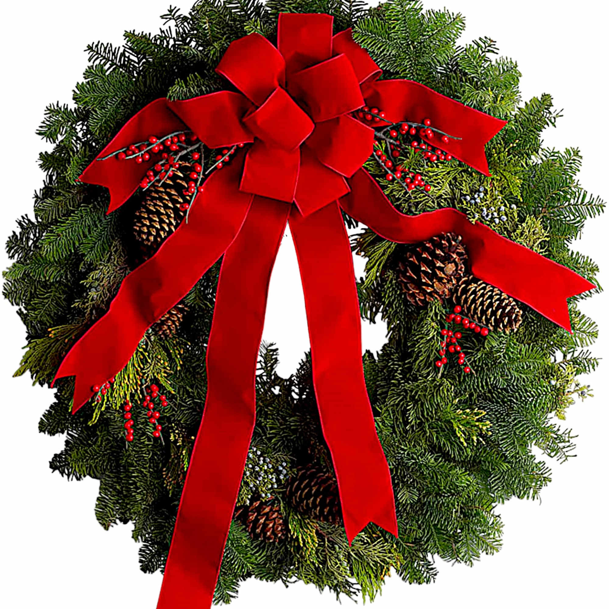 Christmas wreath with a red bow, pinecones, and red berries
