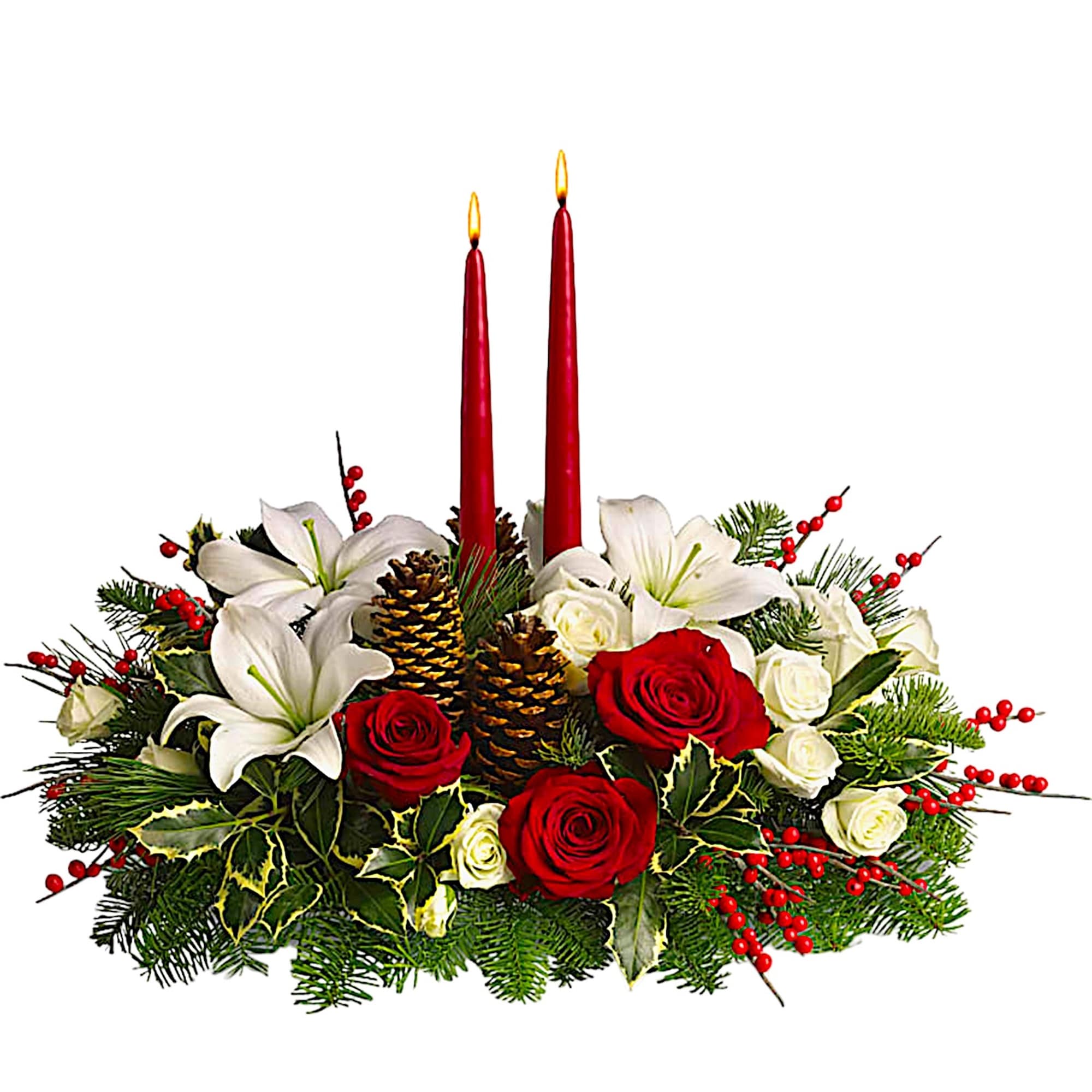 Holiday centerpiece with red candles, white lilies, and red and white roses