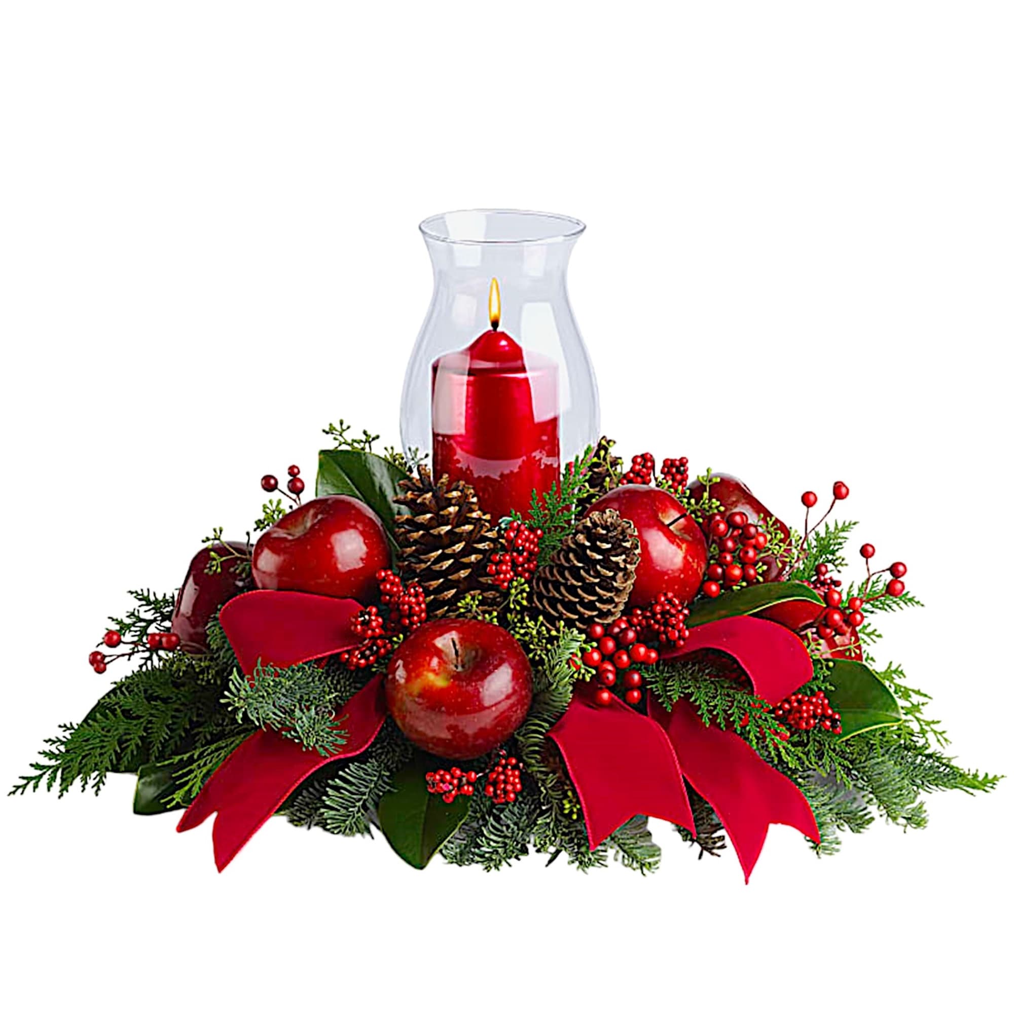 Red candle in a glass hurricane surrounded by apples, pinecones, and ribbon