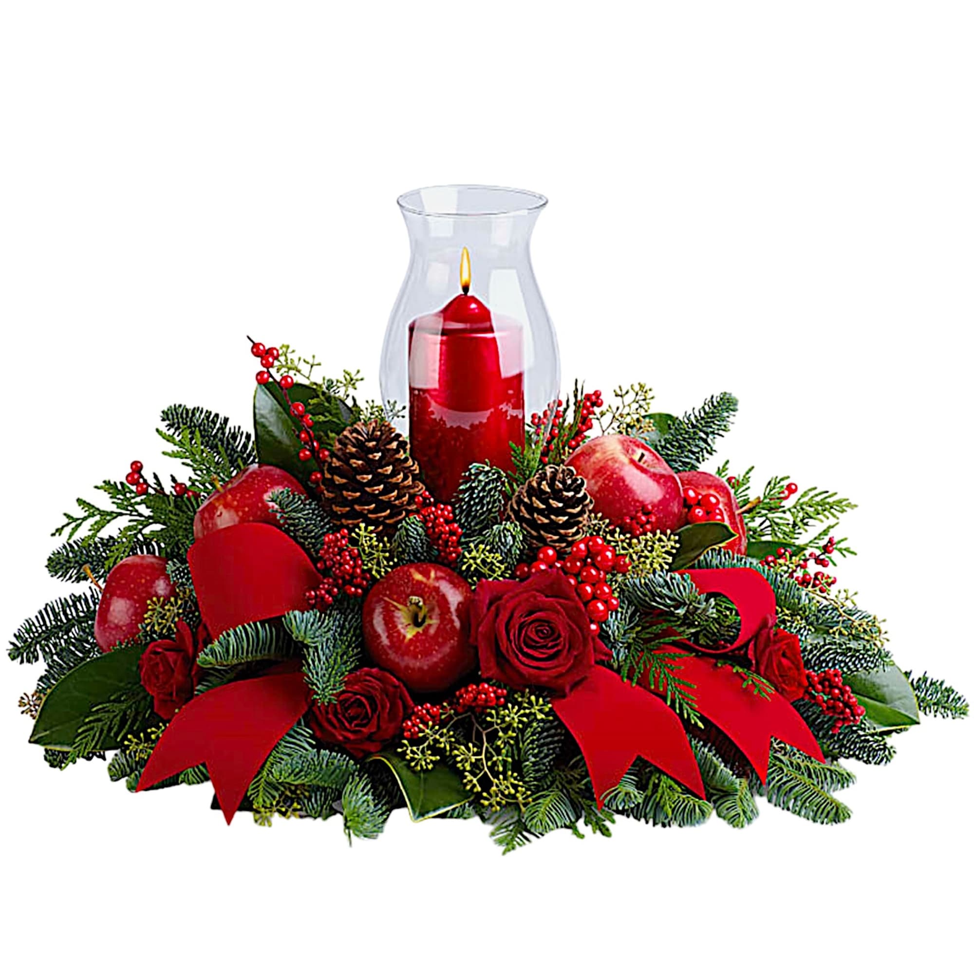 Red candle in a glass hurricane surrounded by apples, roses, and pinecones