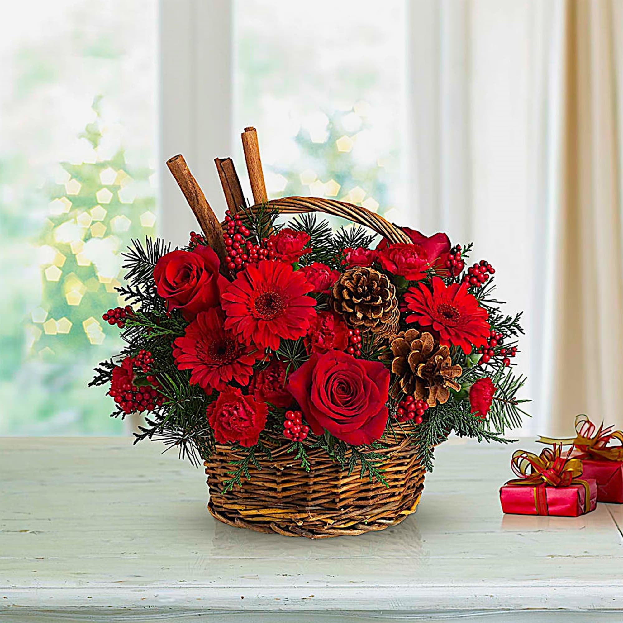 Red roses and gerbera daisies in a wicker basket with pinecones, photo 3 of 4