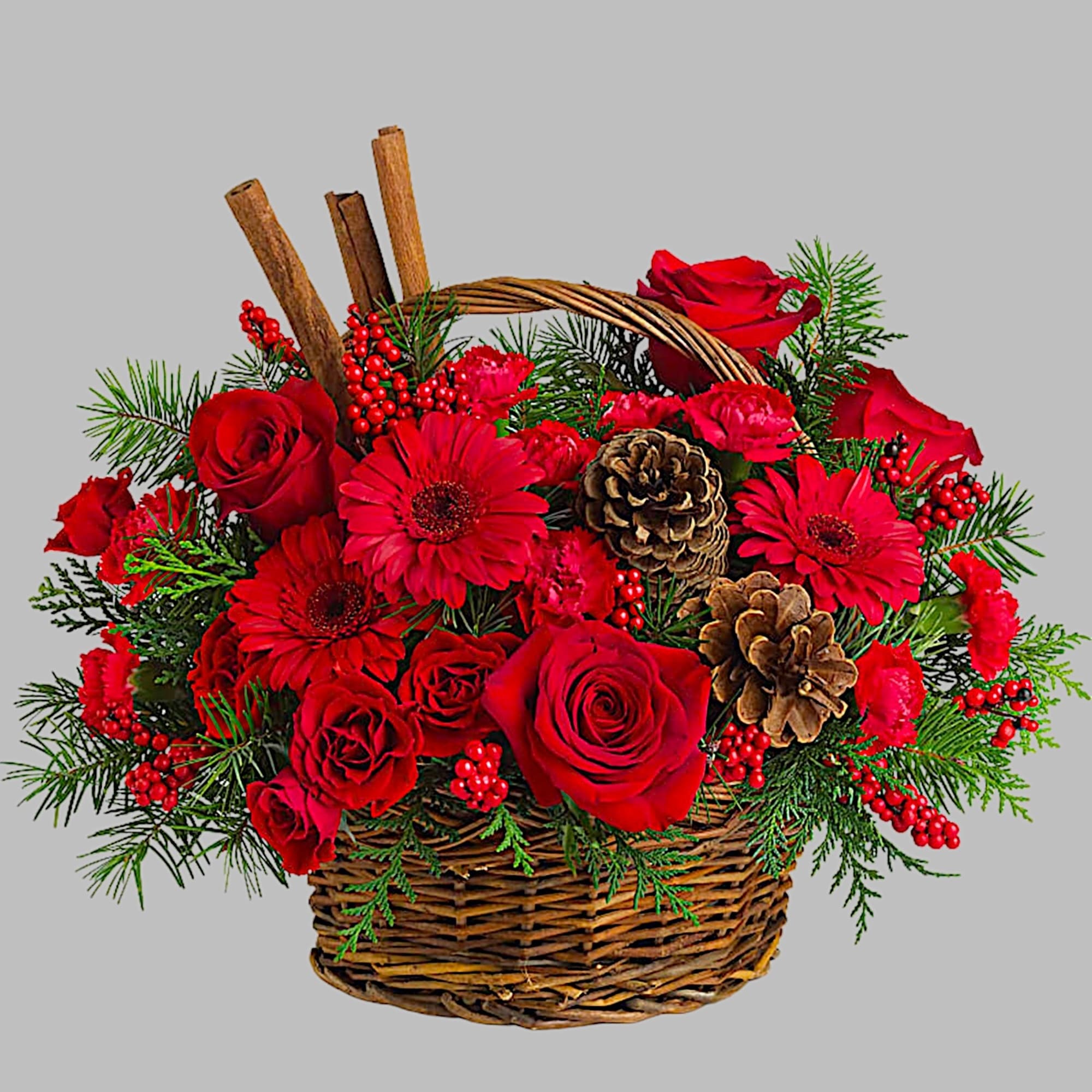 Red roses and gerbera daisies in a wicker basket with pinecones, photo 4 of 4