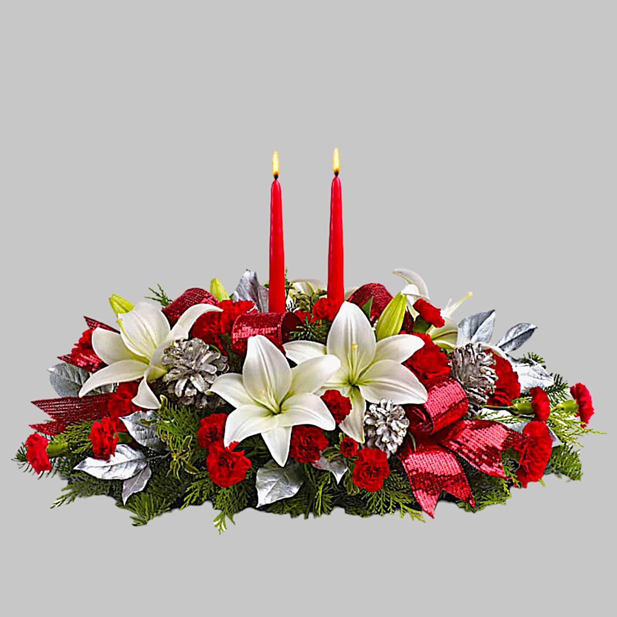 Holiday centerpiece with white lilies, red carnations, and two red candles, photo 3 of 3
