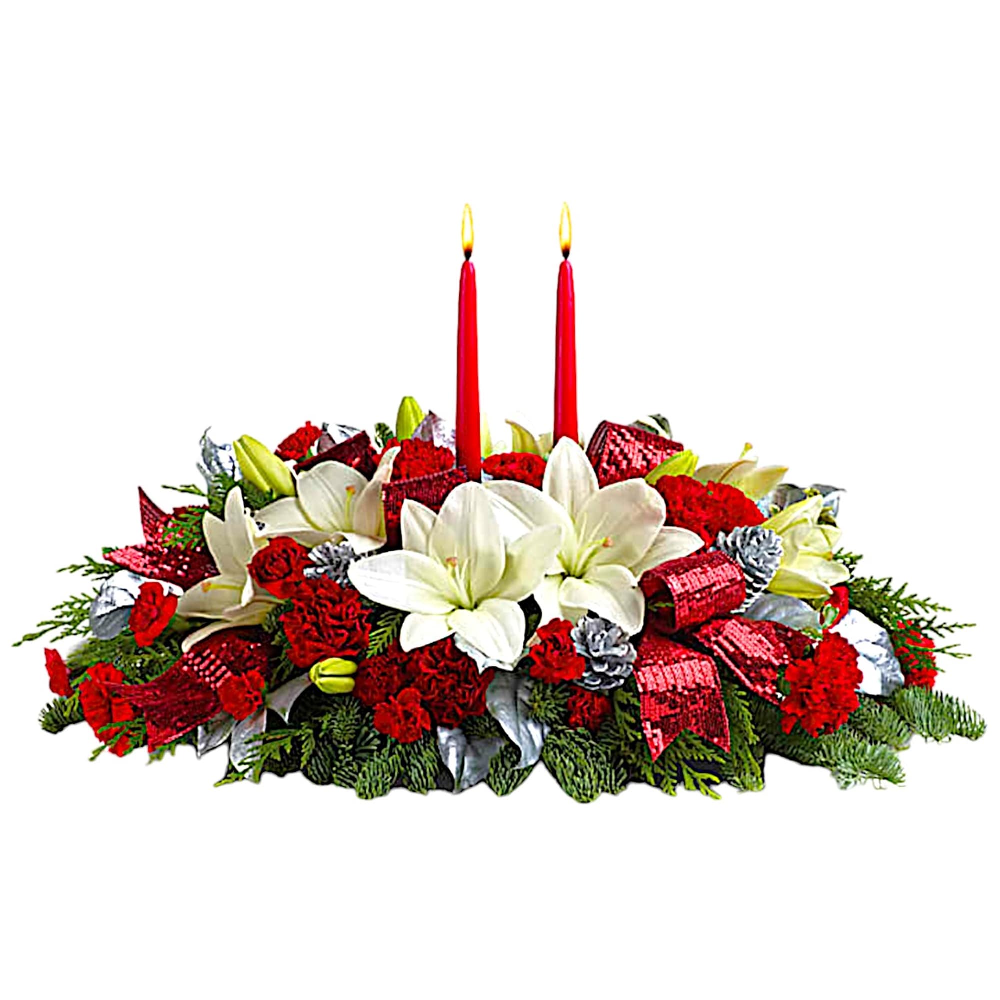 Red and white floral centerpiece with two lit red candles
