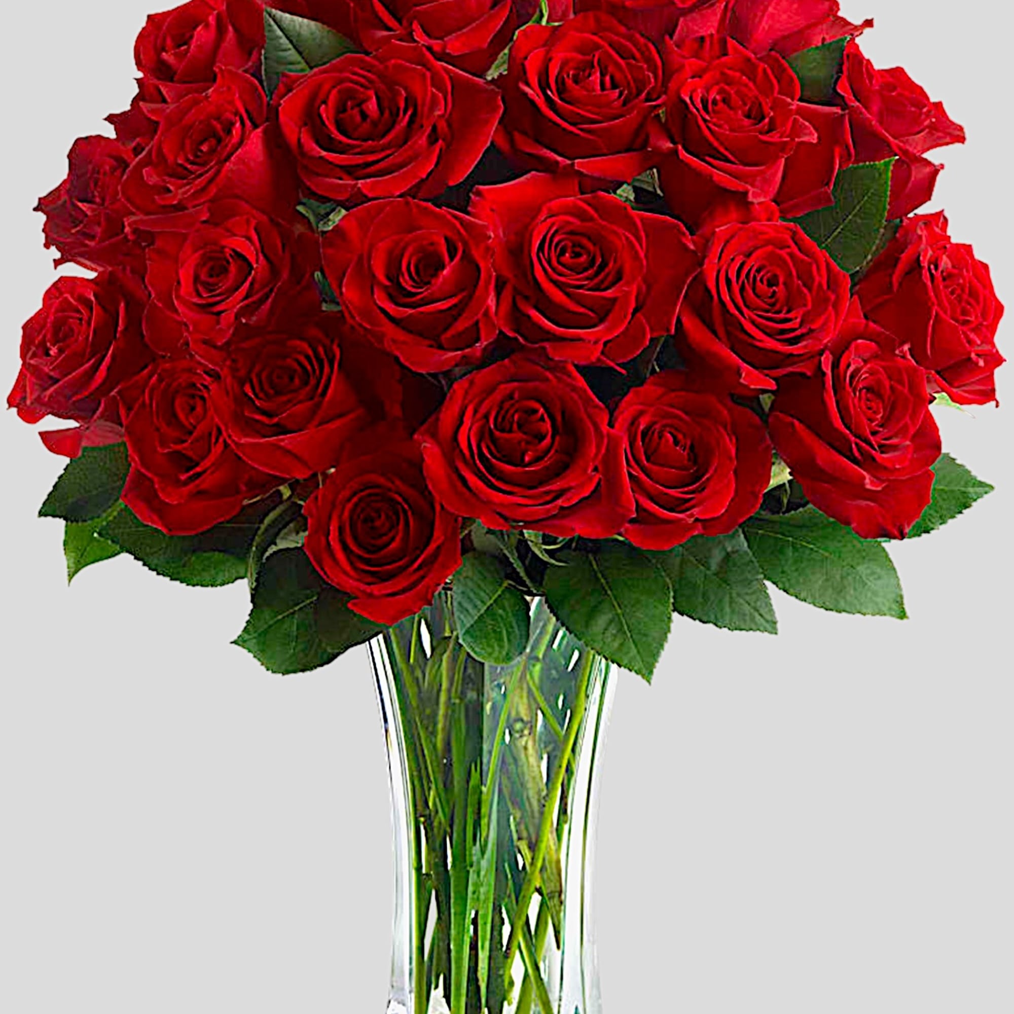 Bouquet of red roses in a clear glass vase, photo 3 of 3