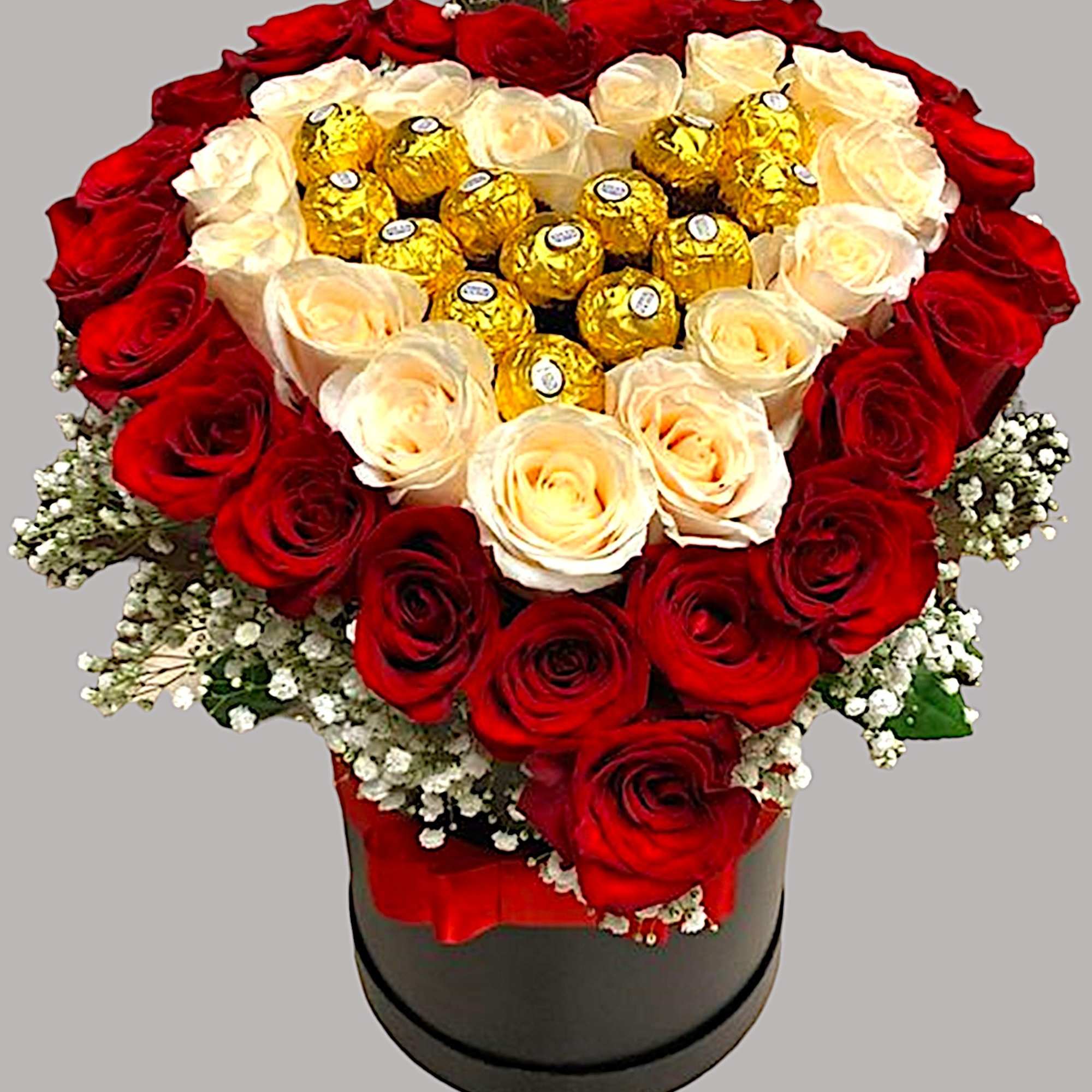 Heart-shaped rose arrangement with gold-wrapped chocolates in a black box, photo 3 of 4