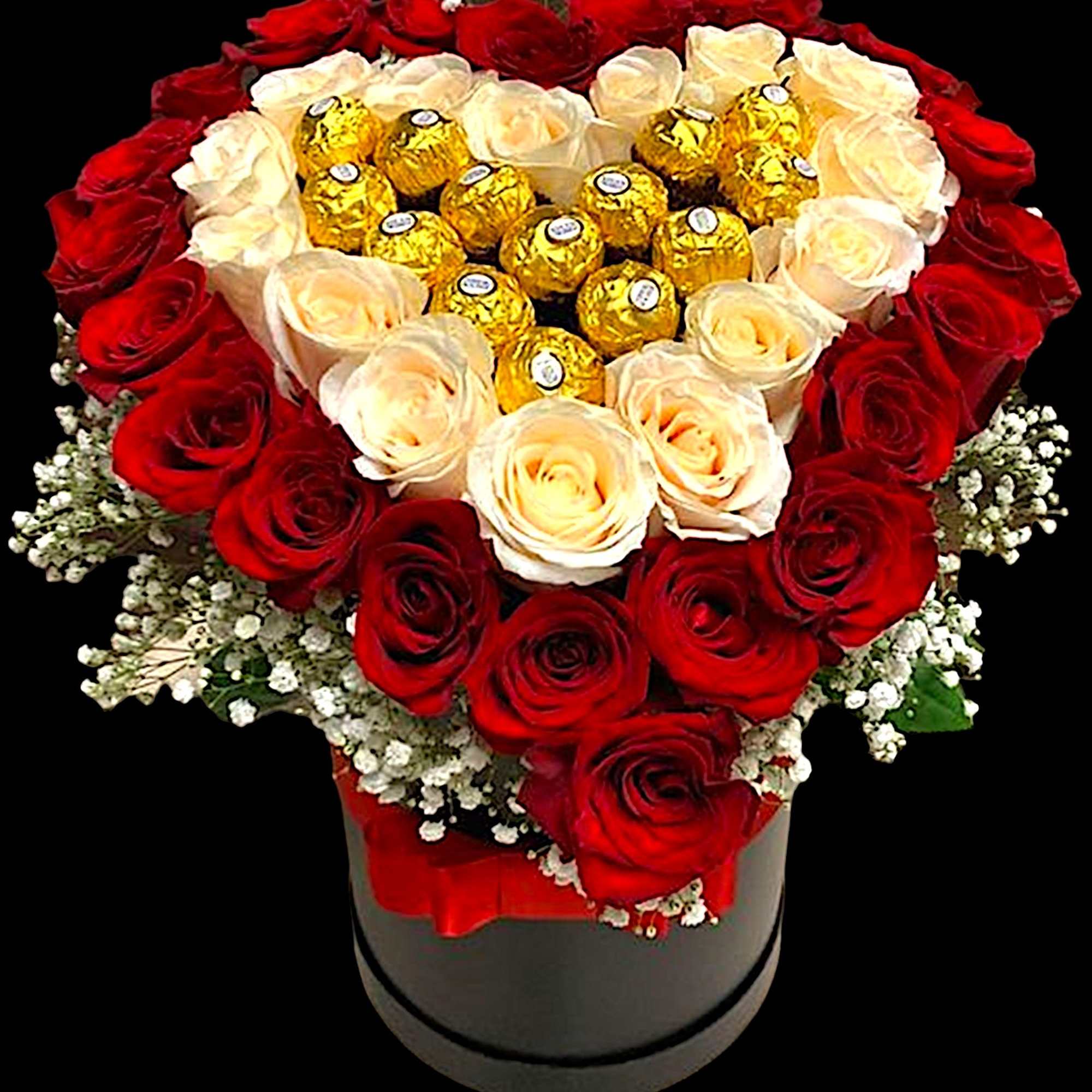 Heart-shaped rose arrangement with gold-wrapped chocolates in a box