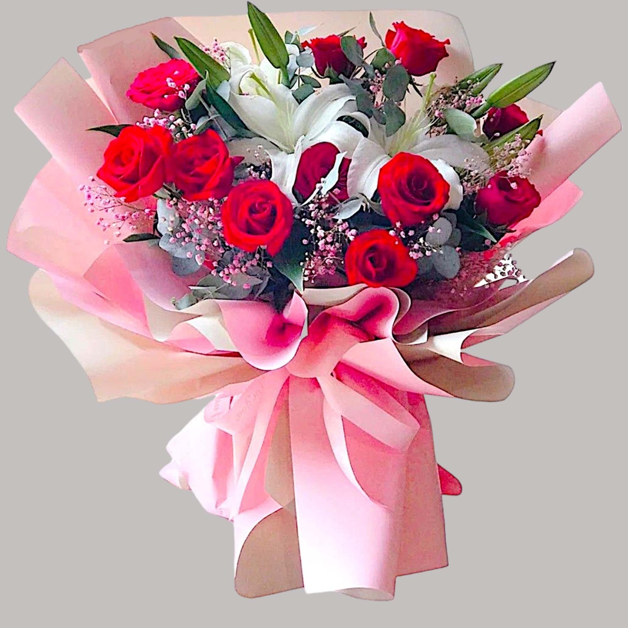 Bouquet of red roses and white lilies wrapped in pink paper, photo 2 of 4