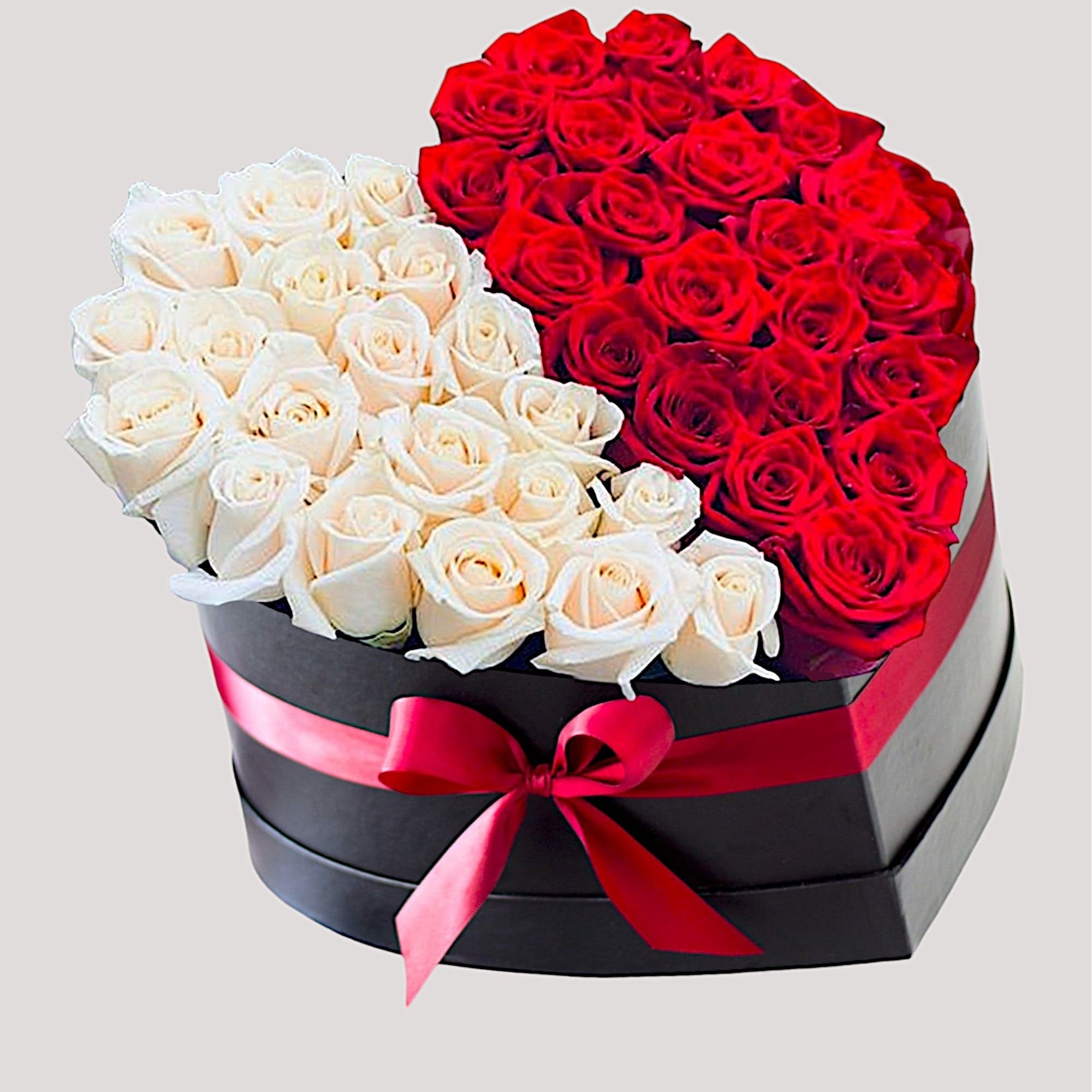 Heart-shaped box of red and white roses tied with a pink ribbon, photo 3 of 4