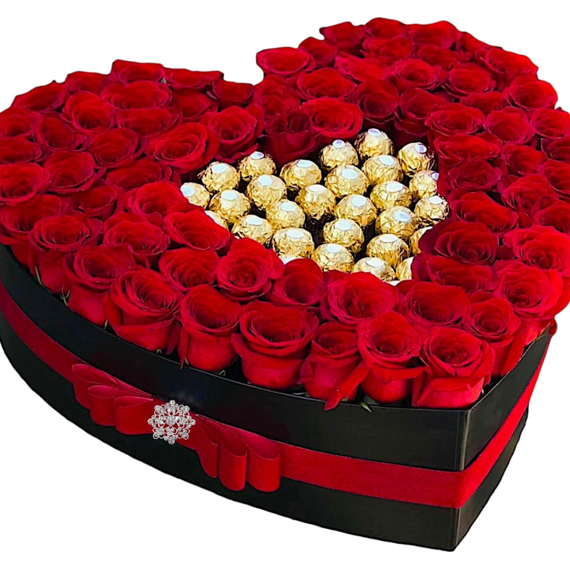 Heart-shaped box of red roses with gold-wrapped chocolates in the center