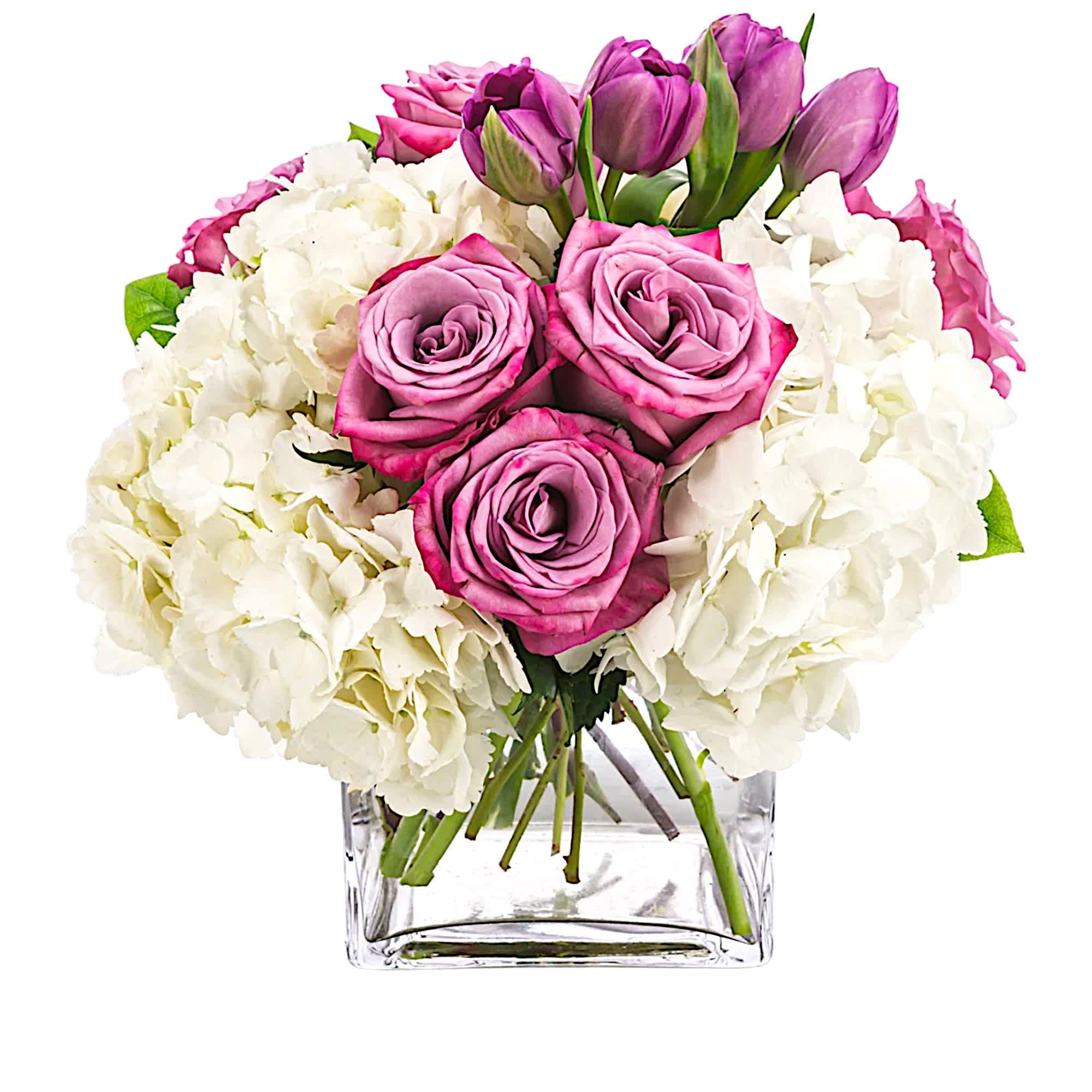 Express your feelings with flowers. Sending this lovely purple and white arrangement