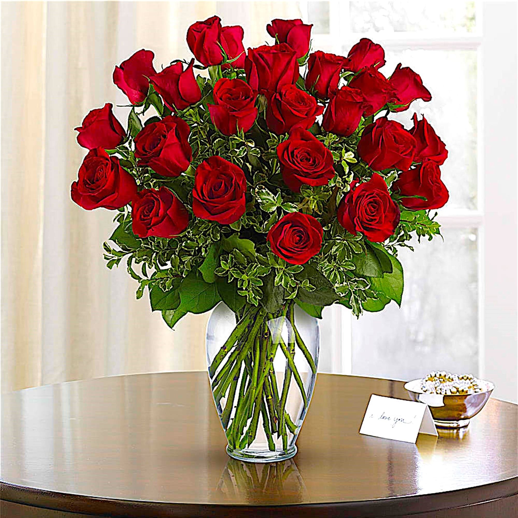 Bouquet of red roses in a clear glass vase, photo 4 of 10