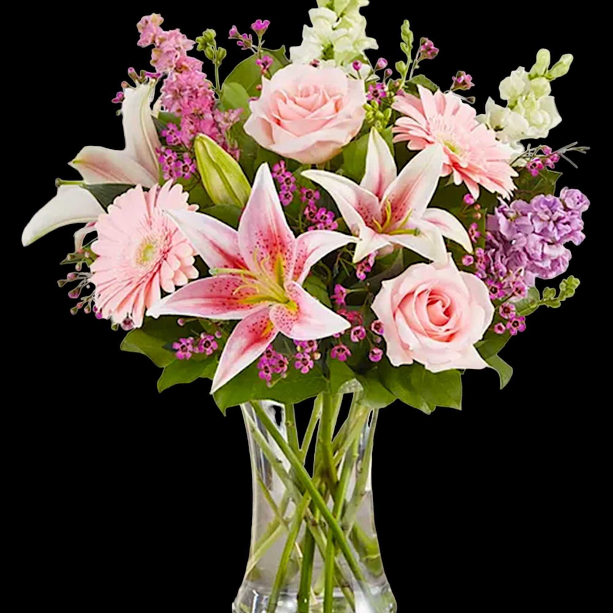 Pink and white mixed bouquet in a clear glass vase