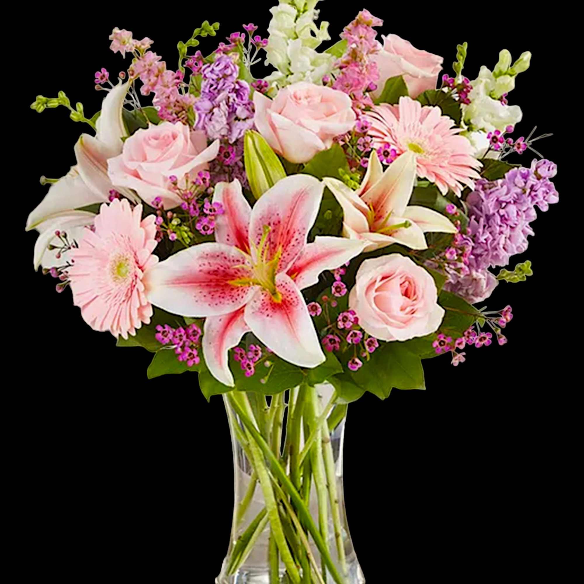 Pink roses and lilies arranged in a clear glass vase, photo 5 of 6