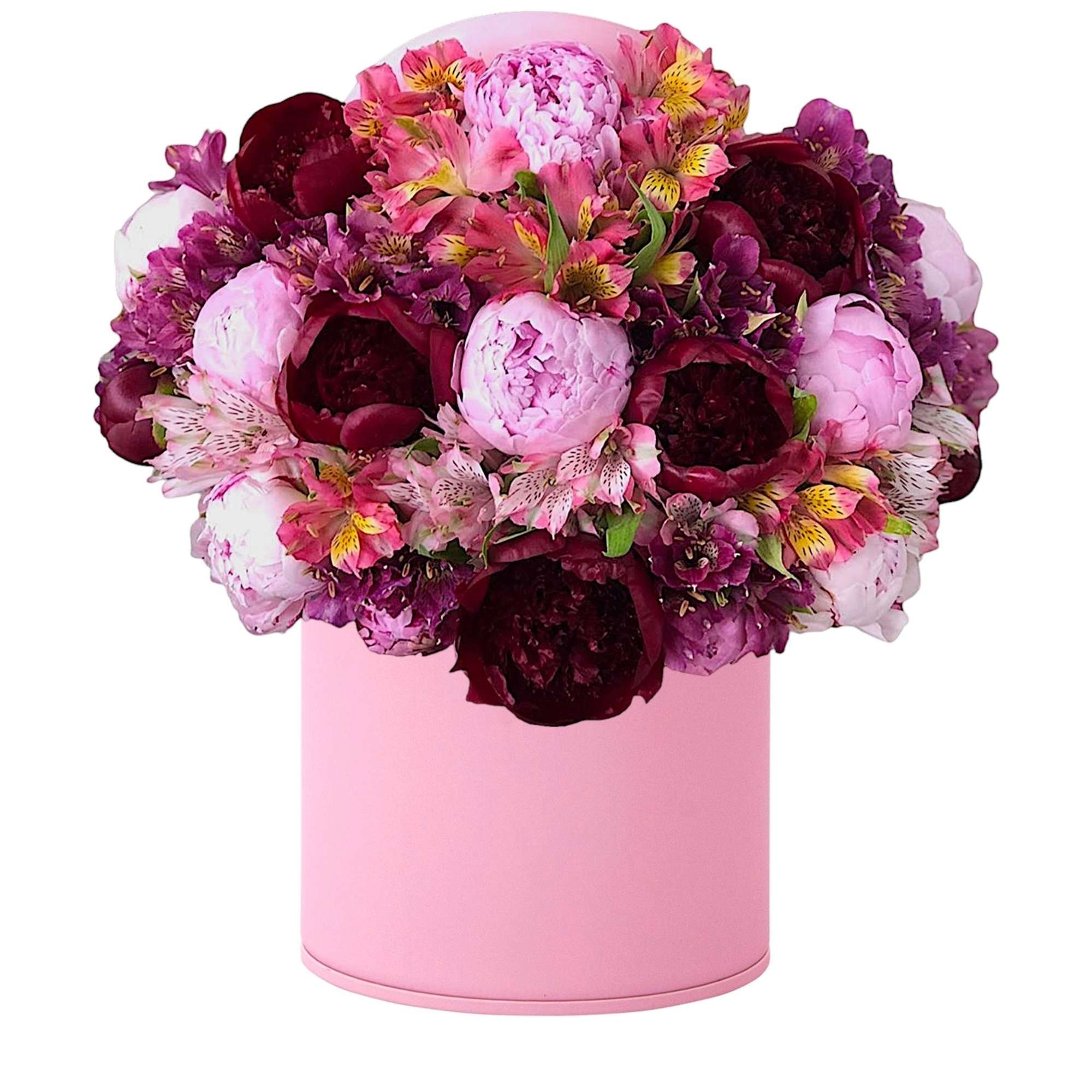 Pink and burgundy flower arrangement in a round pink box