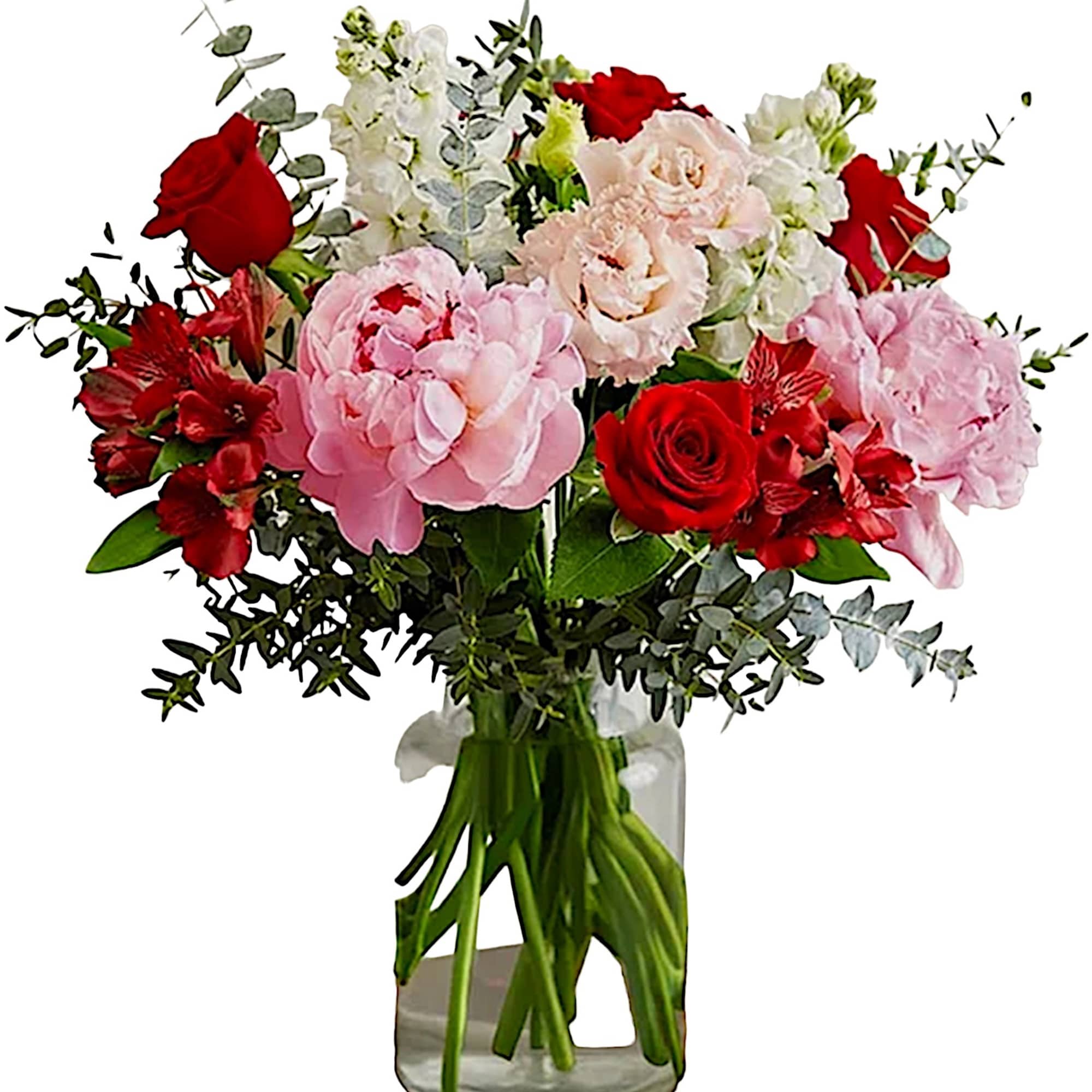 Bouquet of pink and red flowers in a clear glass vase