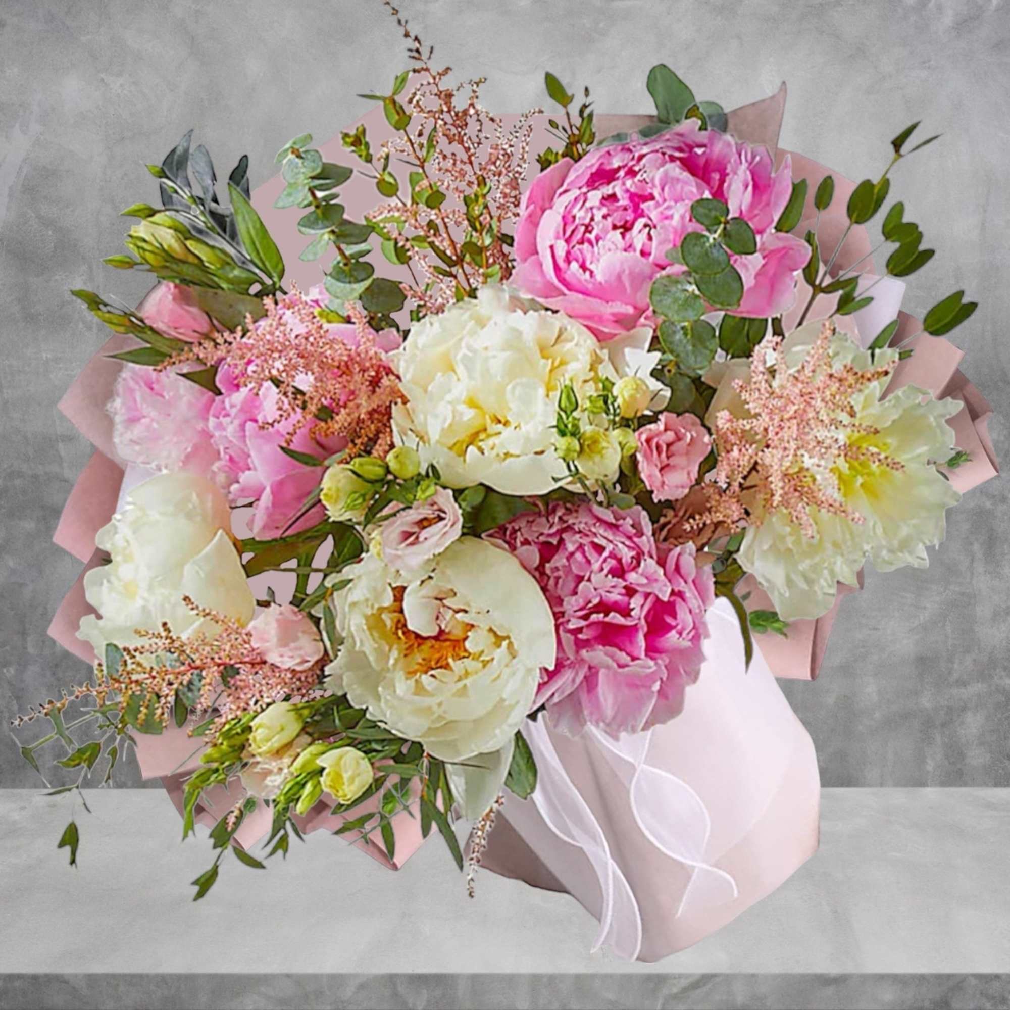 Pink and white peony bouquet wrapped in pale pink paper, photo 2 of 4