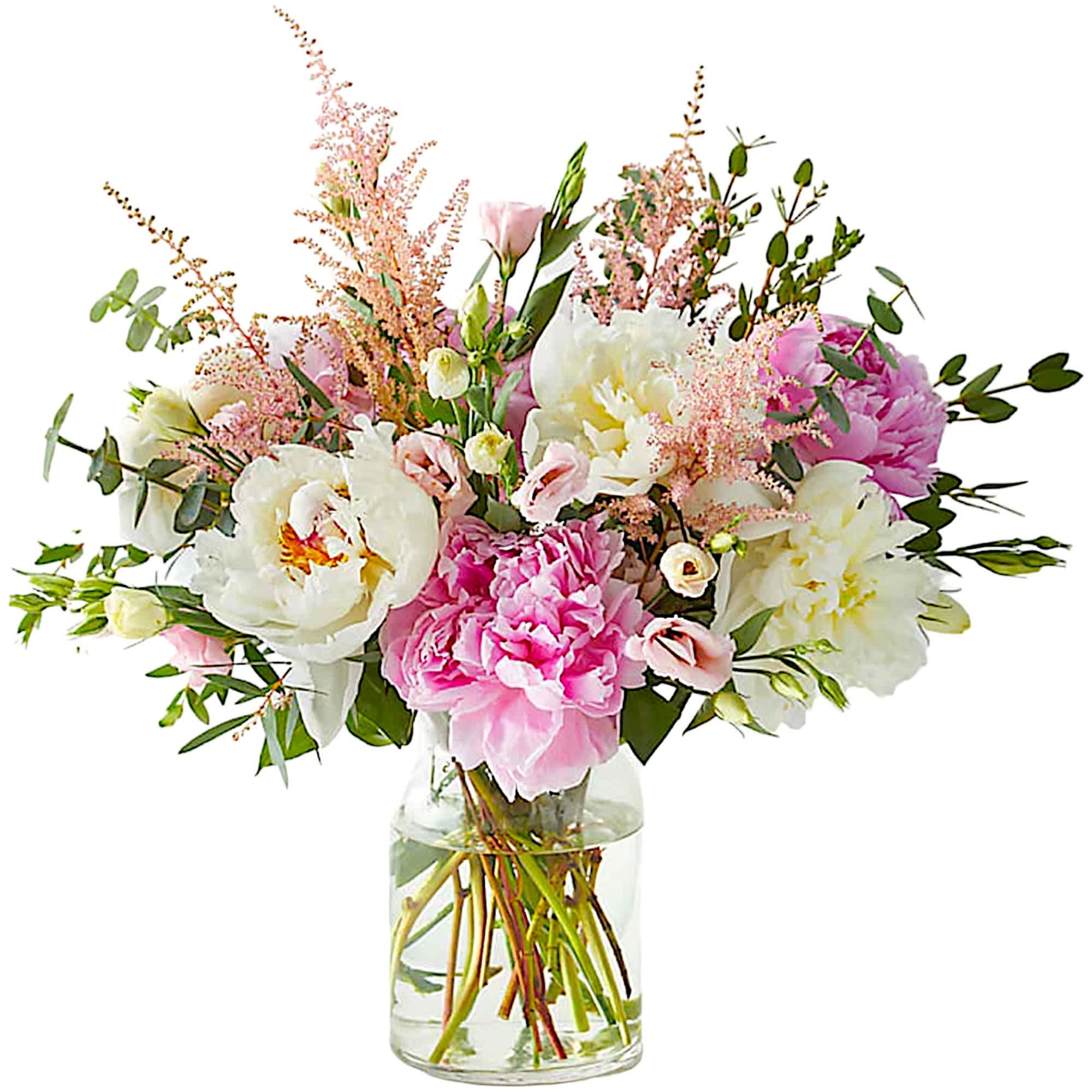 Pink and white mixed bouquet in a clear glass vase