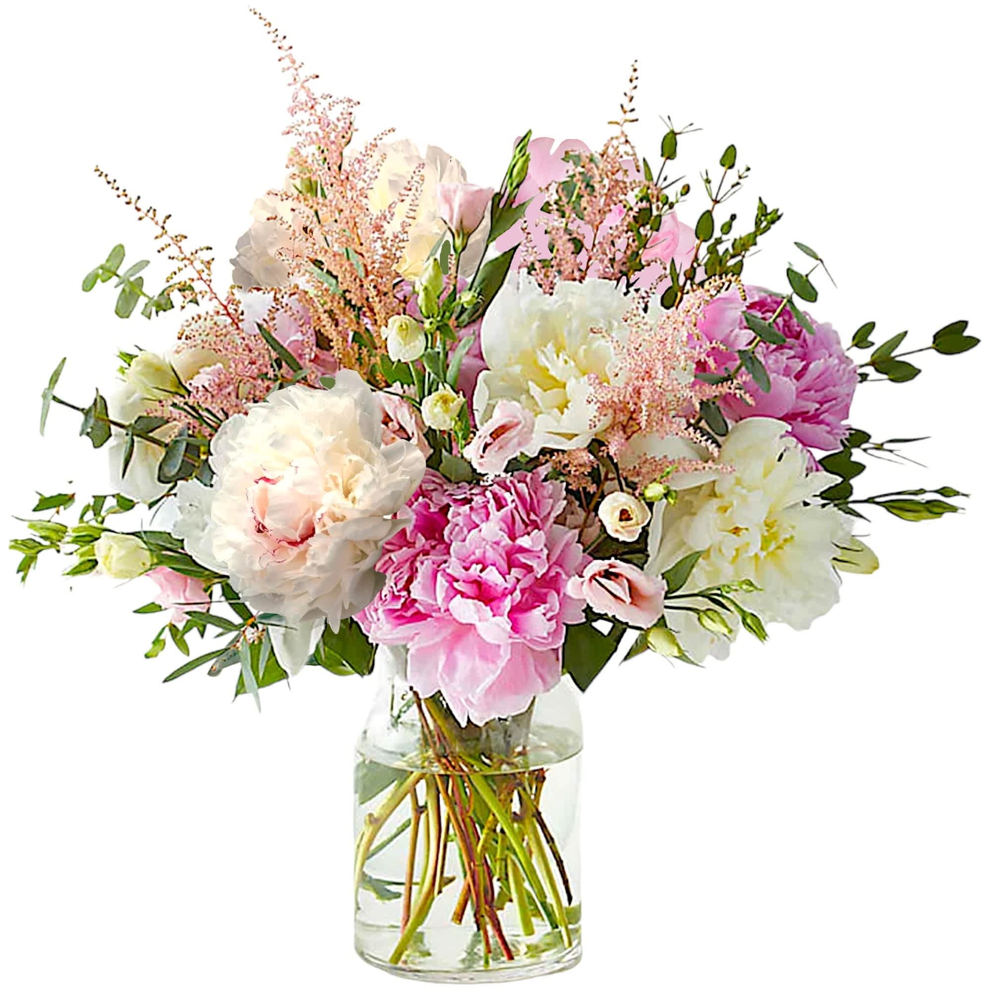 Pink and white mixed bouquet in a clear glass vase