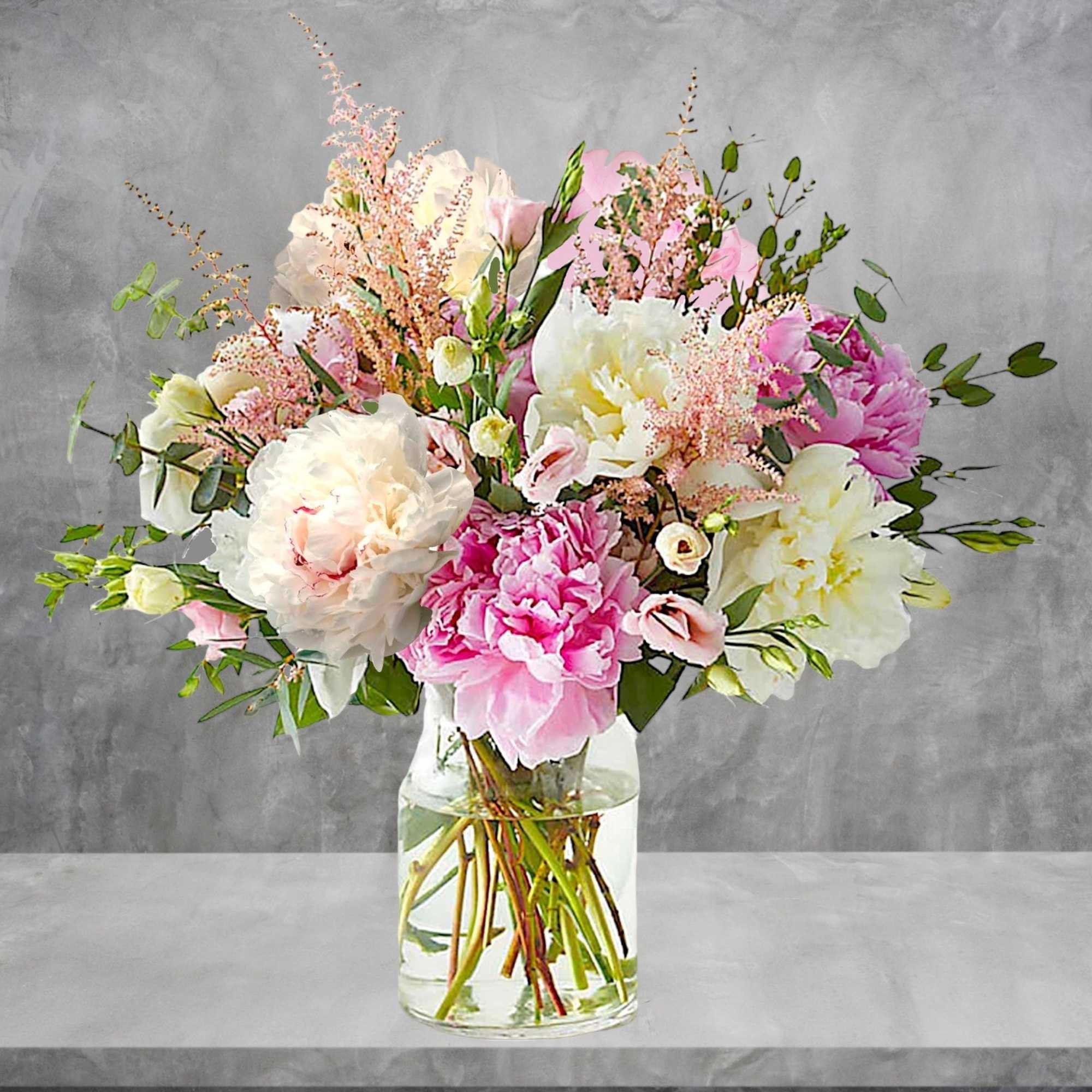 Pink and white bouquet in a clear glass vase, photo 2 of 4