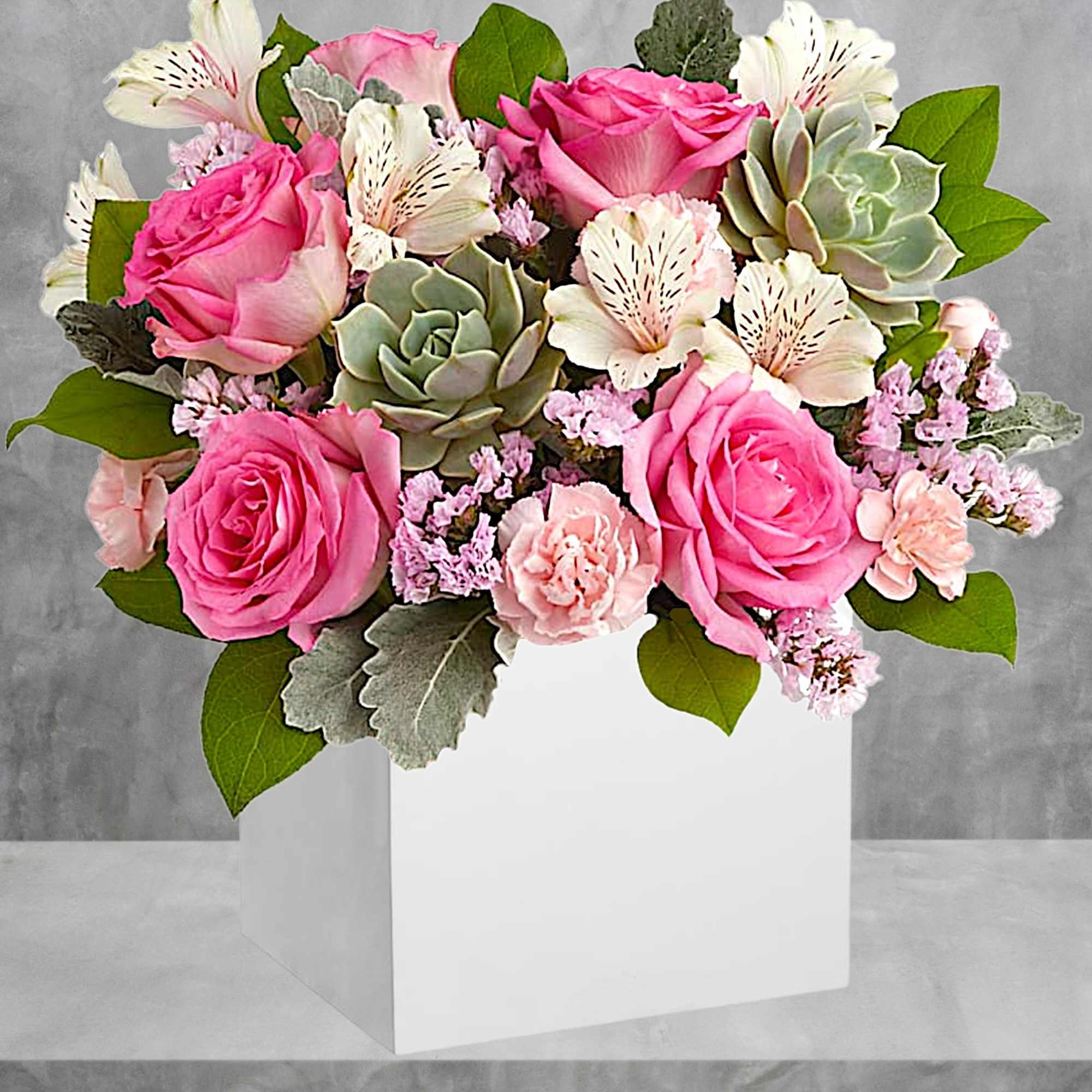 Pink roses and white alstroemeria in a white box with succulents, photo 2 of 4