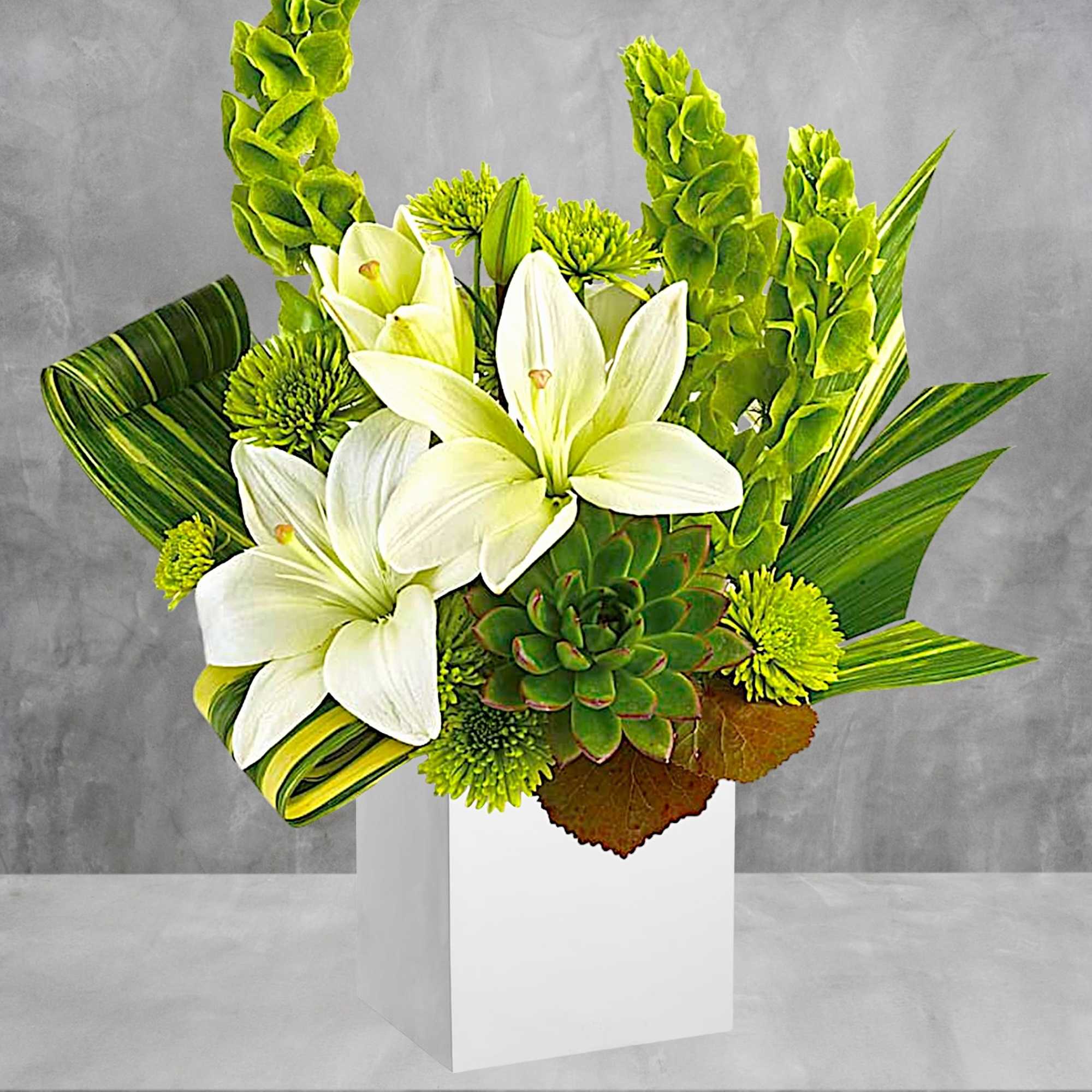 White lilies and green blooms in a white box vase, photo 2 of 4