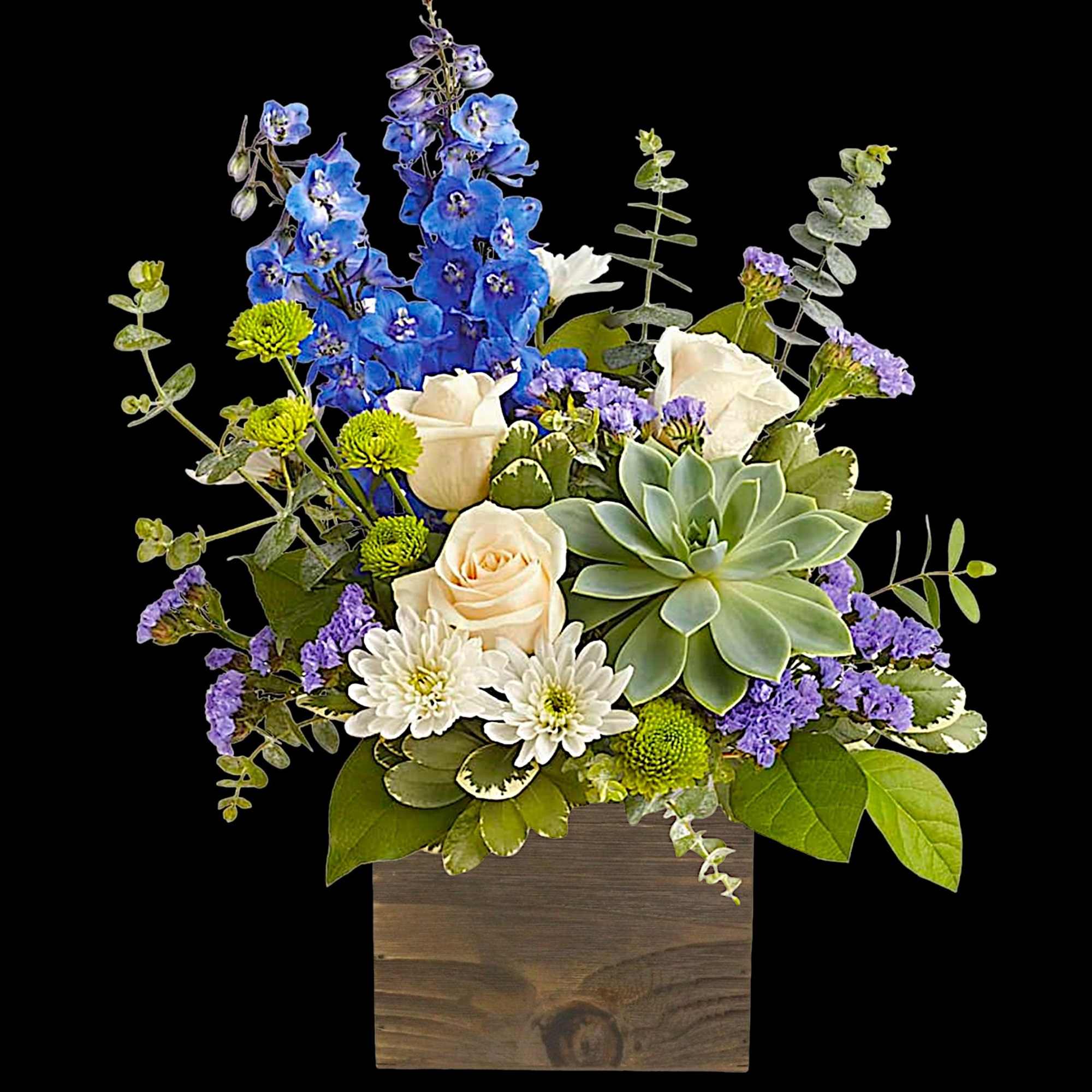 Mixed bouquet in a wooden box with blue flowers, white roses, and a succulent
