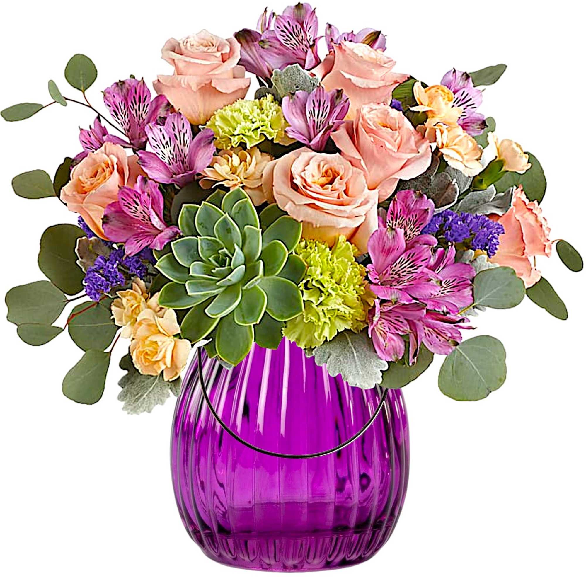 Mixed bouquet of pink roses and purple flowers in a purple glass vase