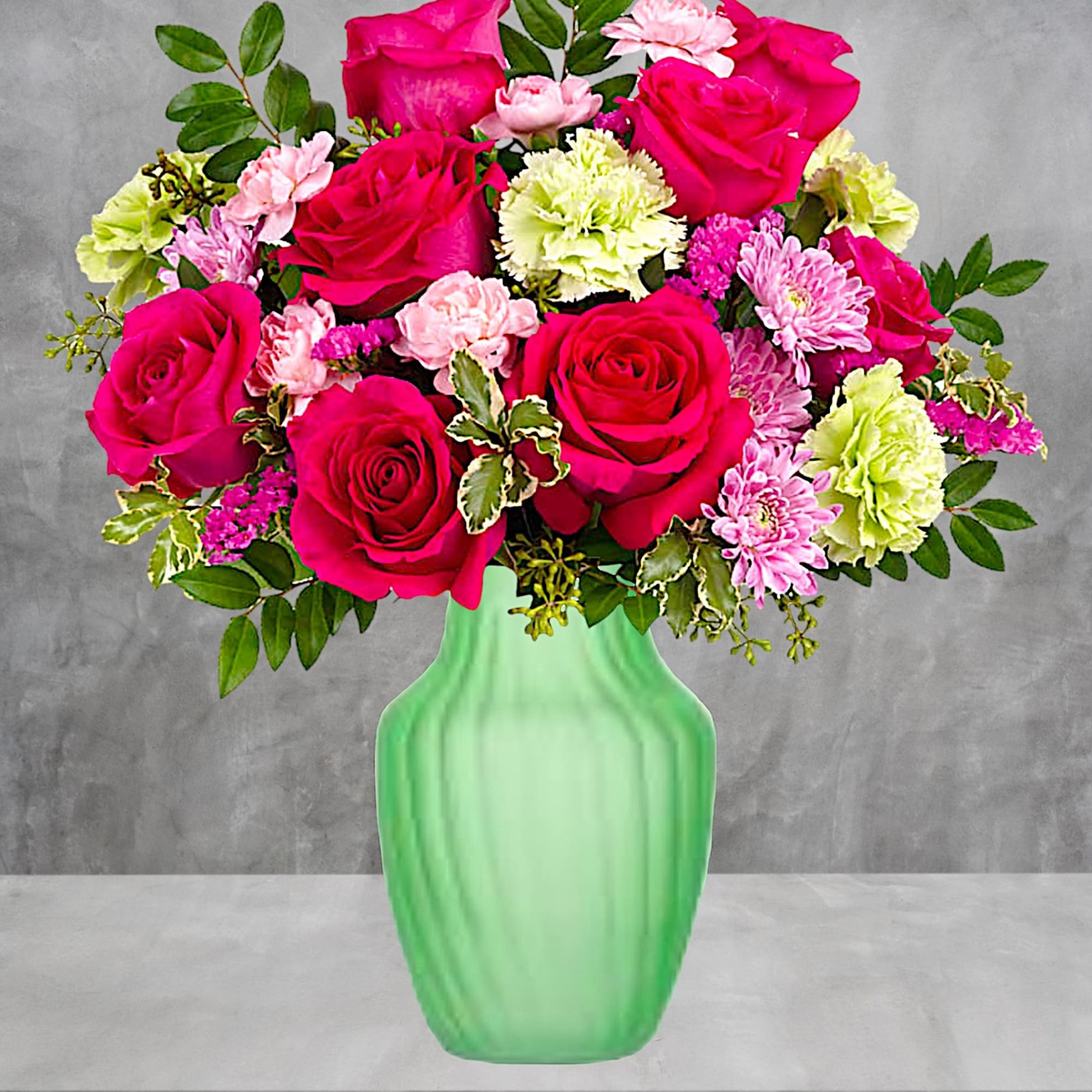 Pink roses and carnations in a green glass vase, photo 2 of 4