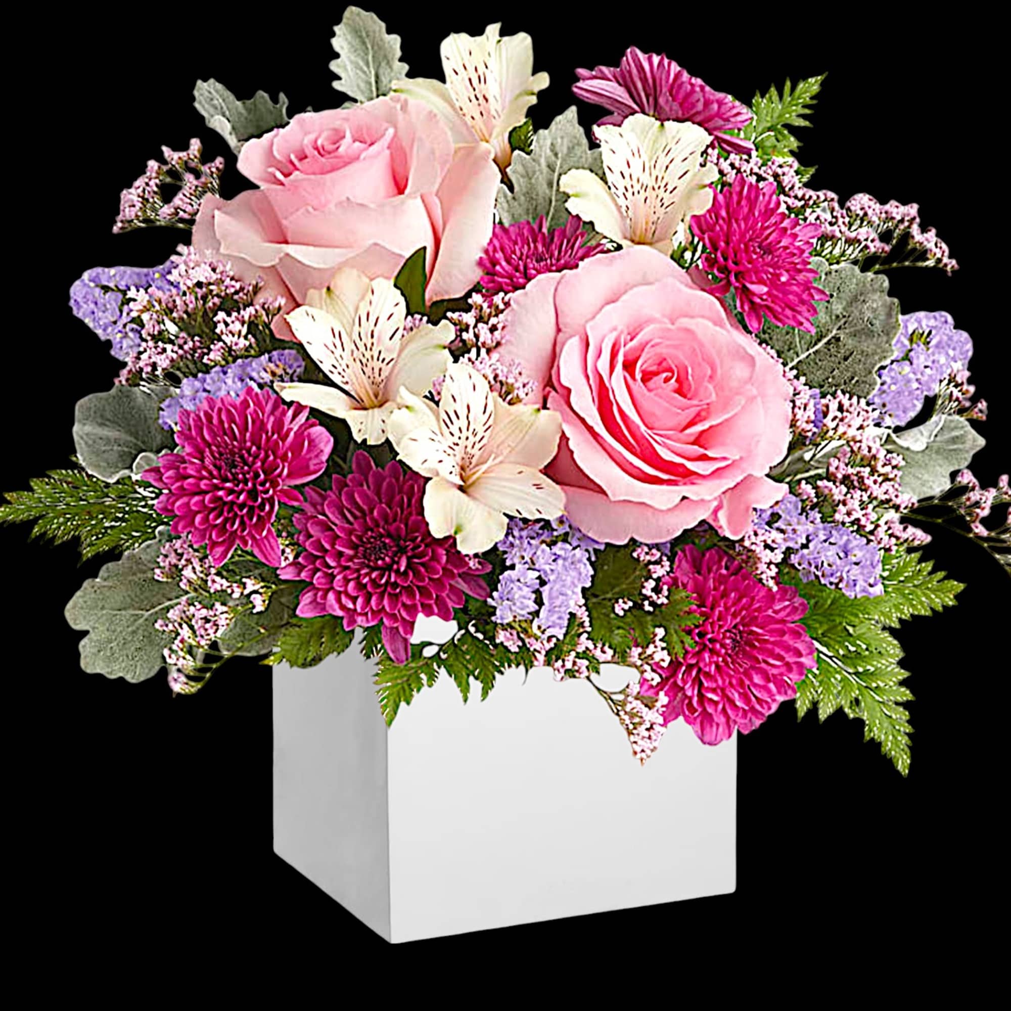Pink roses and purple flowers in a white cube vase