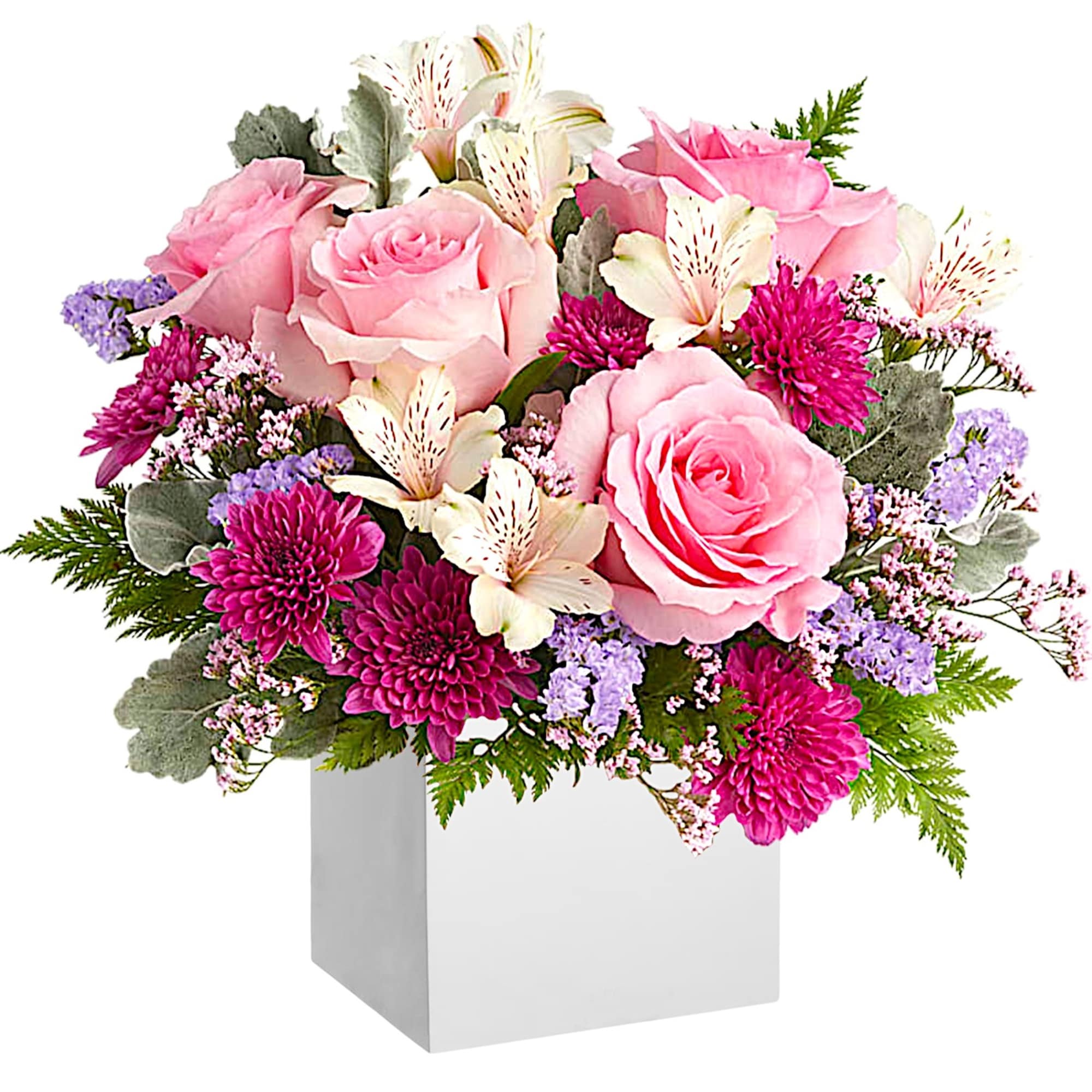 Pink roses and mixed flowers arranged in a white box