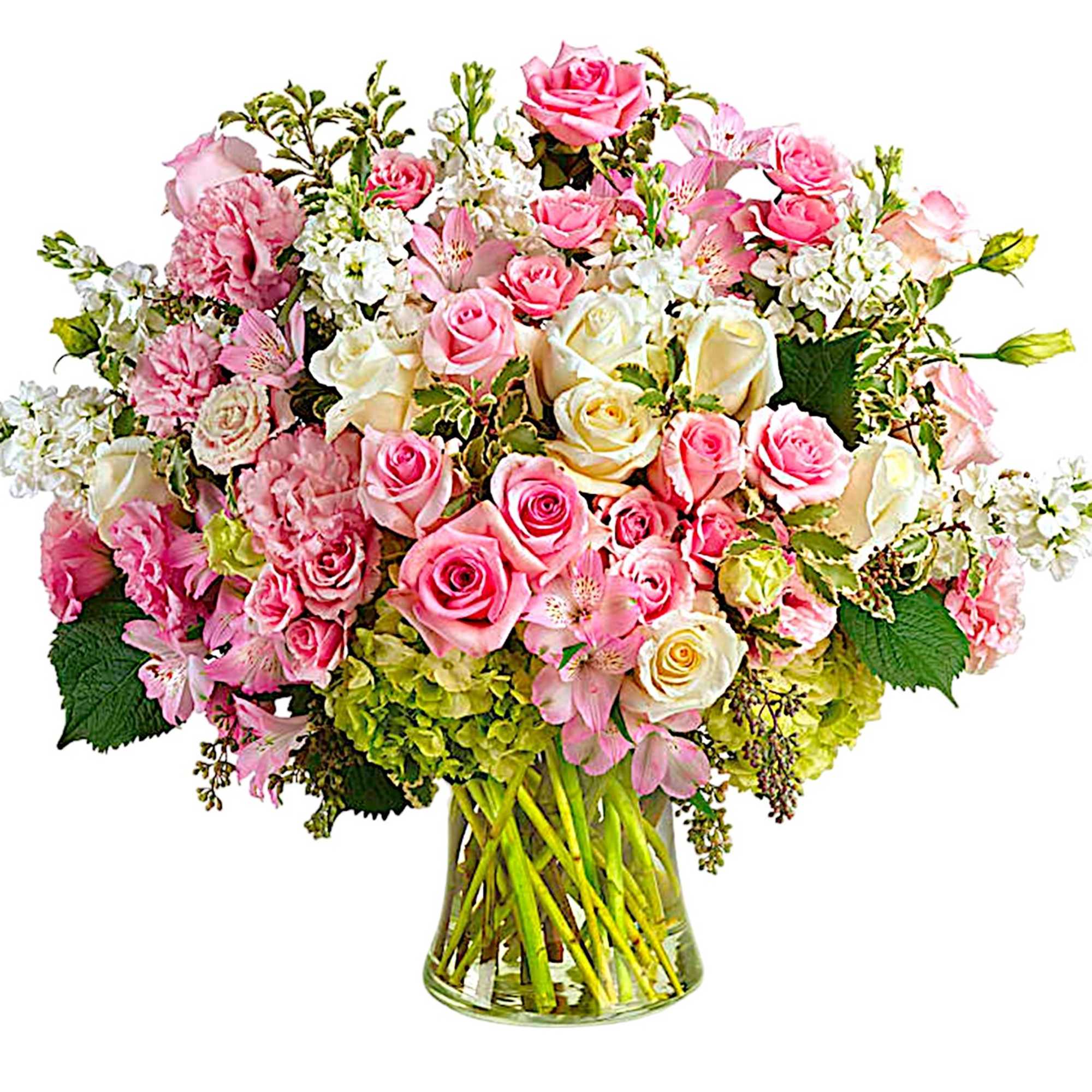 Large bouquet of pink and white roses in a clear glass vase