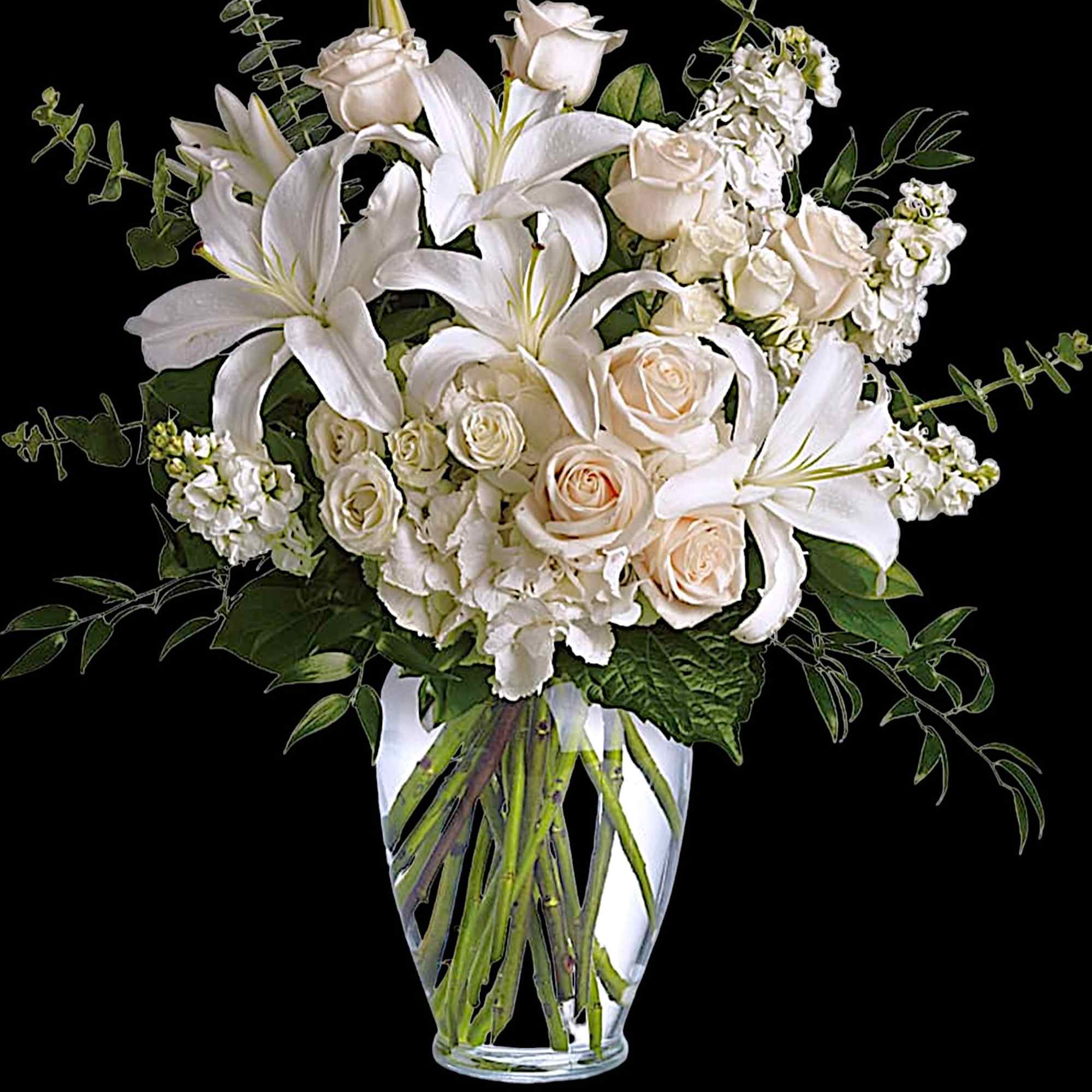 White lilies and cream roses arranged in a clear glass vase, photo 4 of 5