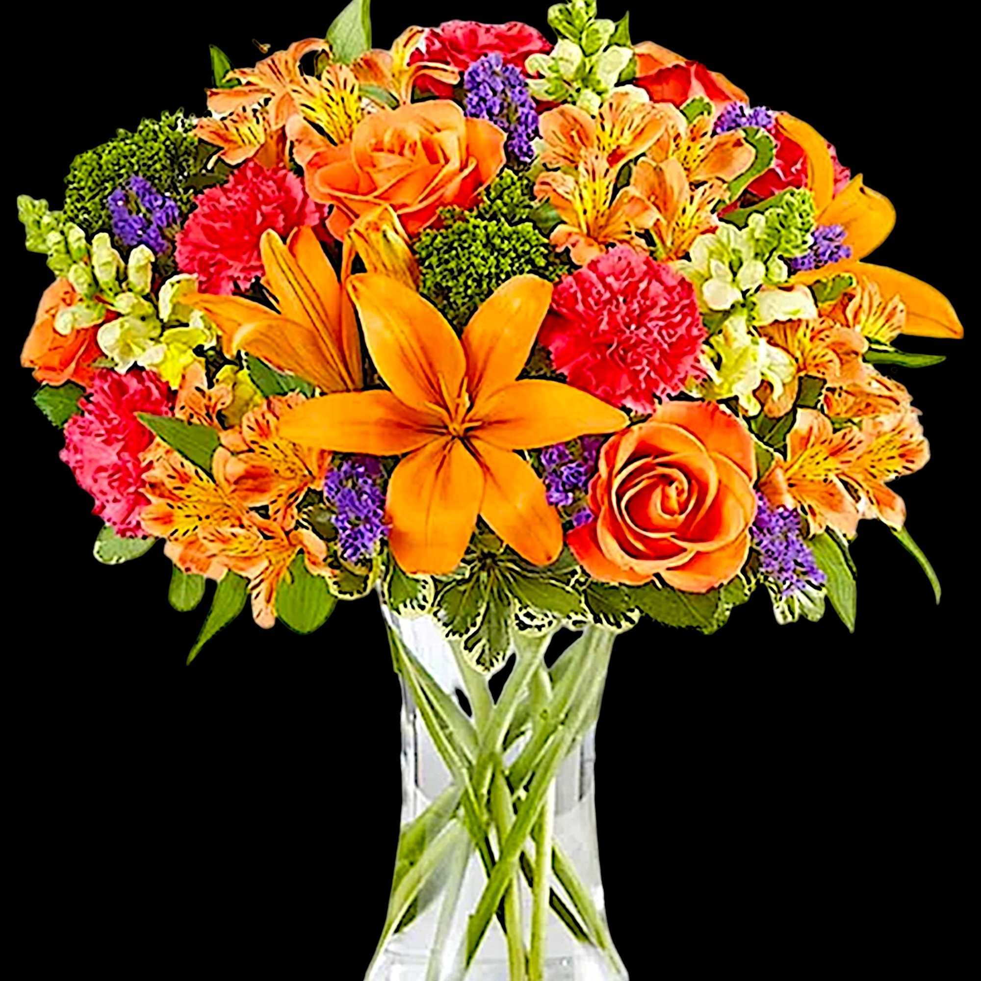 Bright mixed bouquet in a clear glass vase with orange, pink, purple, and yellow flowers
