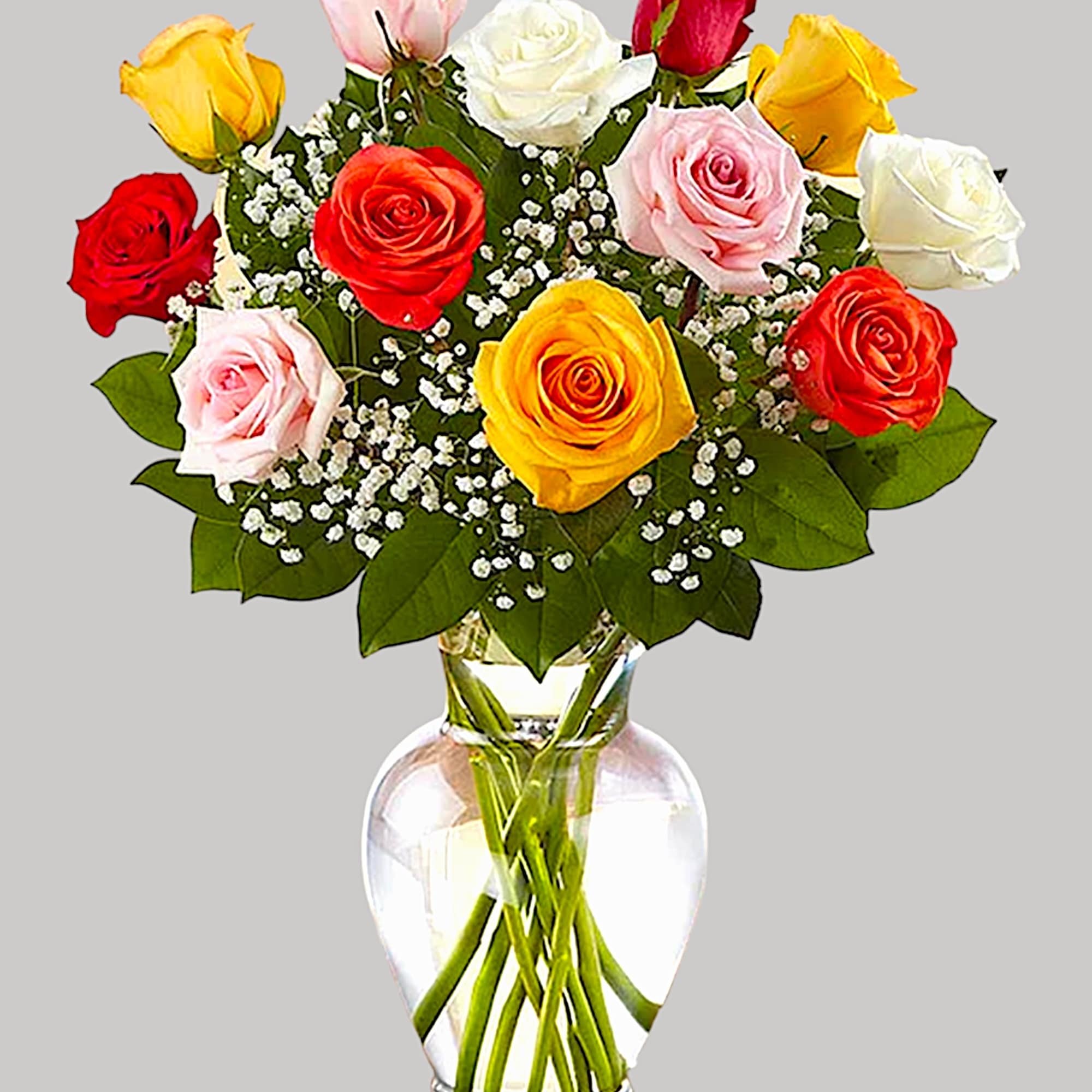 Mixed roses in a clear glass vase with baby's breath, photo 5 of 5