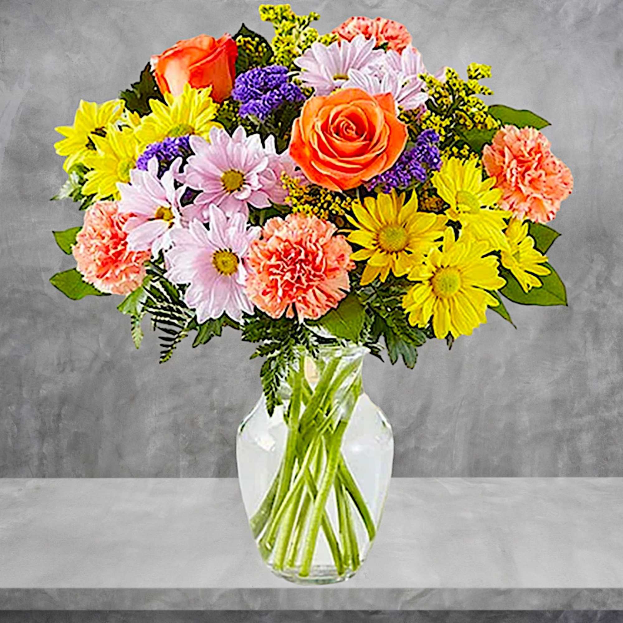 Mixed bouquet of roses, daisies, and carnations in a clear glass vase, photo 3 of 5