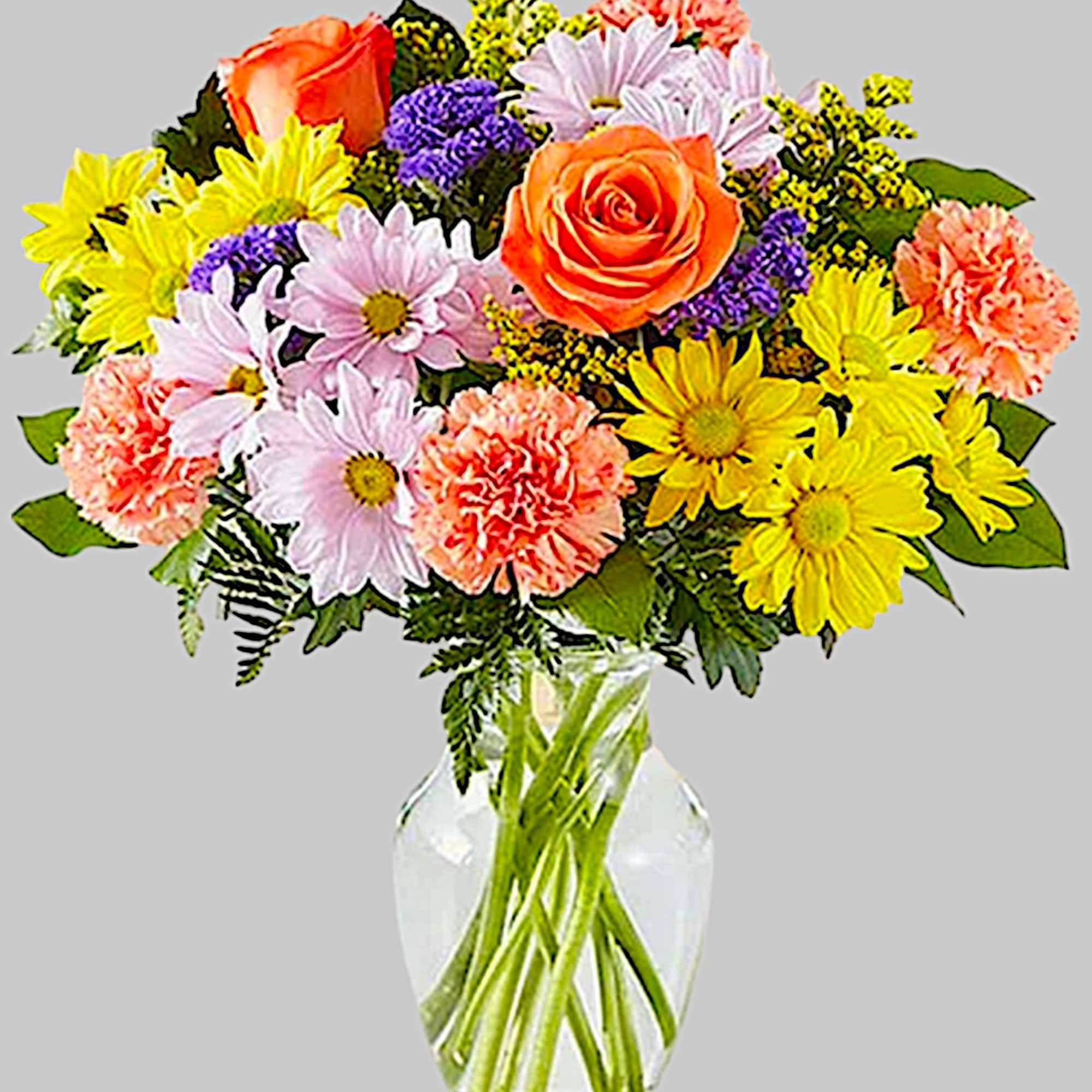 Mixed bouquet of roses, daisies, and carnations in a clear glass vase, photo 5 of 5