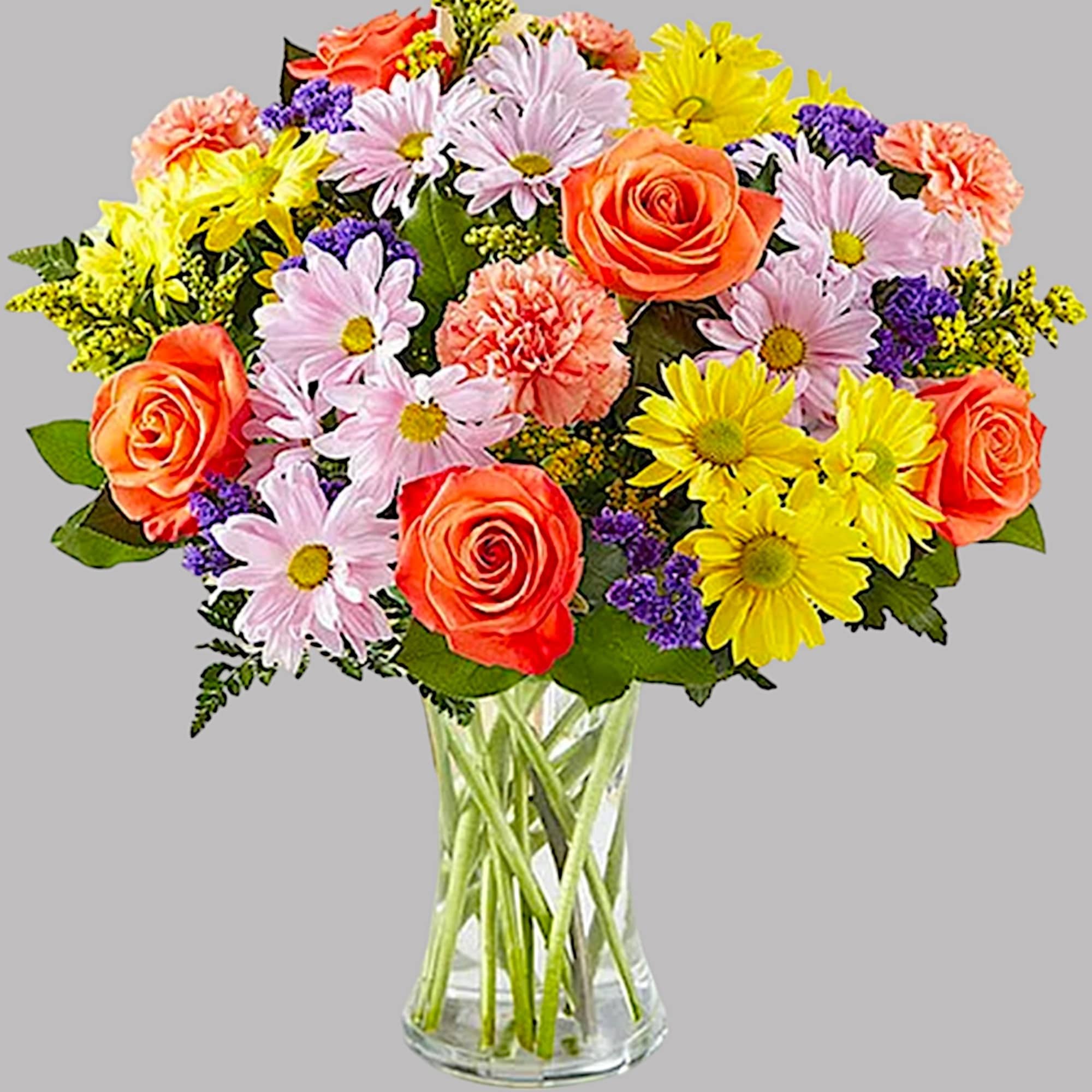 Mixed bouquet of roses, daisies, and carnations in a clear glass vase, photo 5 of 5
