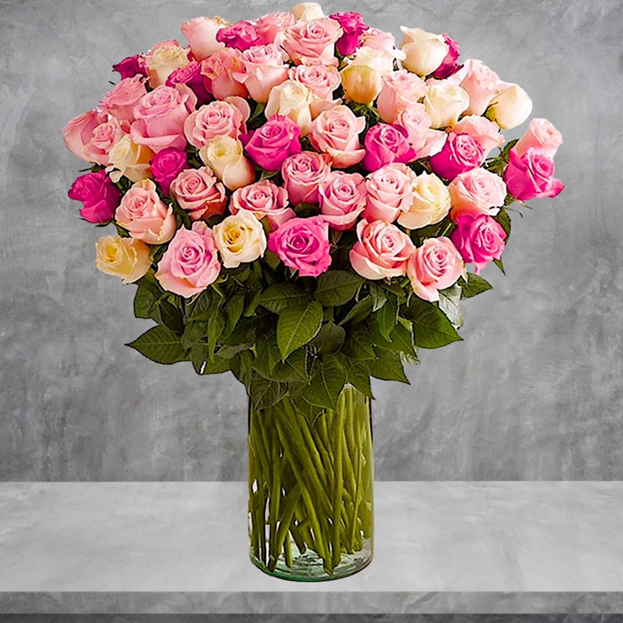 Bouquet of pink and white roses in a clear glass vase, photo 3 of 6