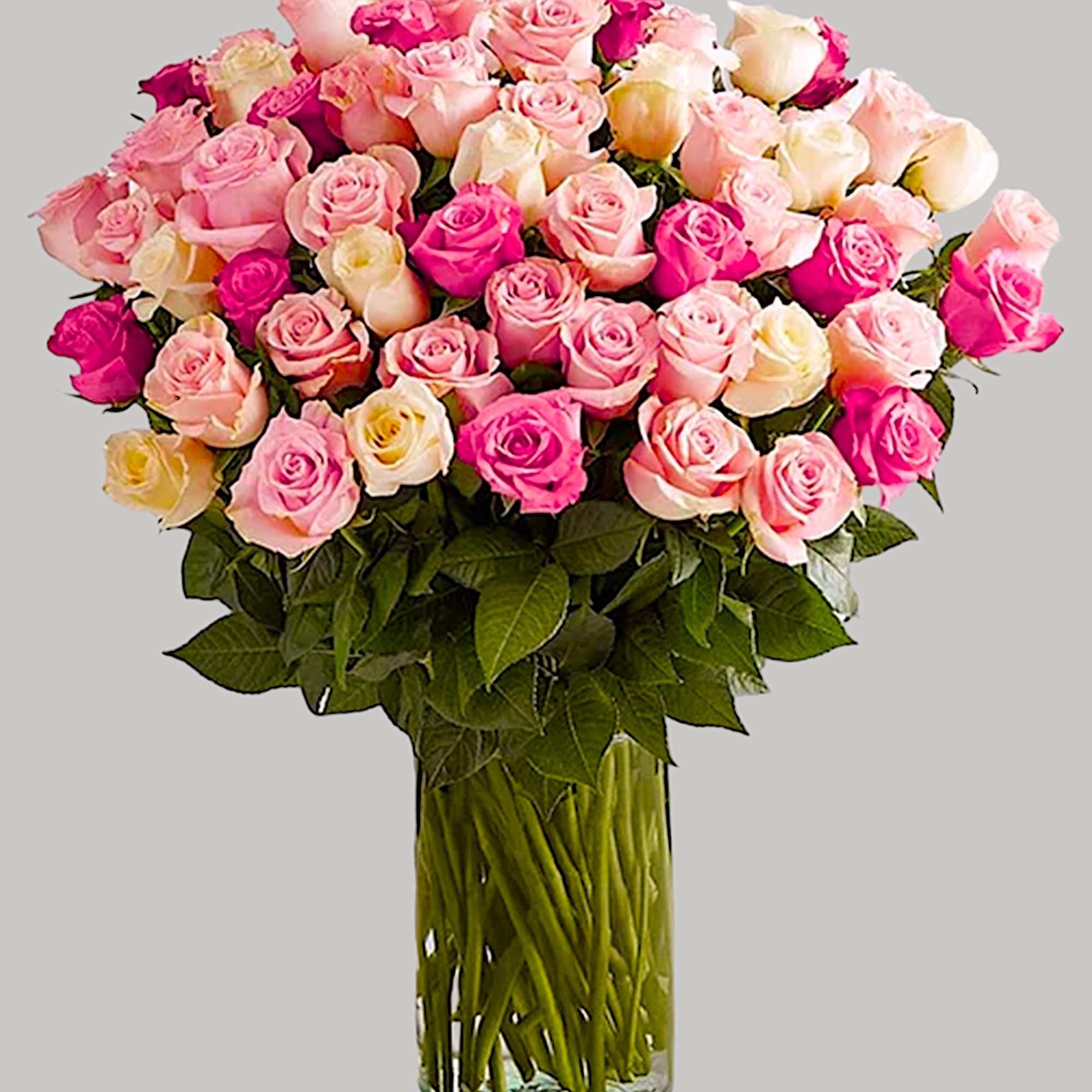Large bouquet of pink and white roses in a clear glass vase, photo 5 of 6
