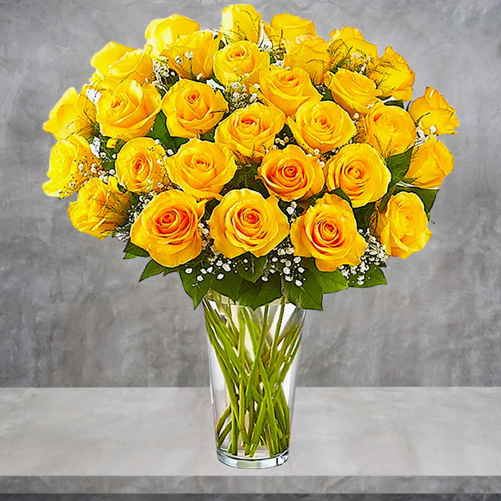 Yellow roses arranged in a clear glass vase, photo 3 of 5