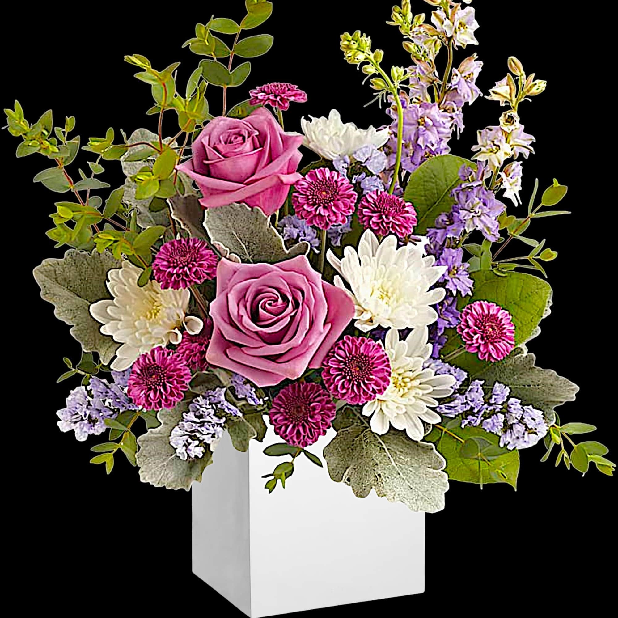 Pink roses and white daisies in a white square vase