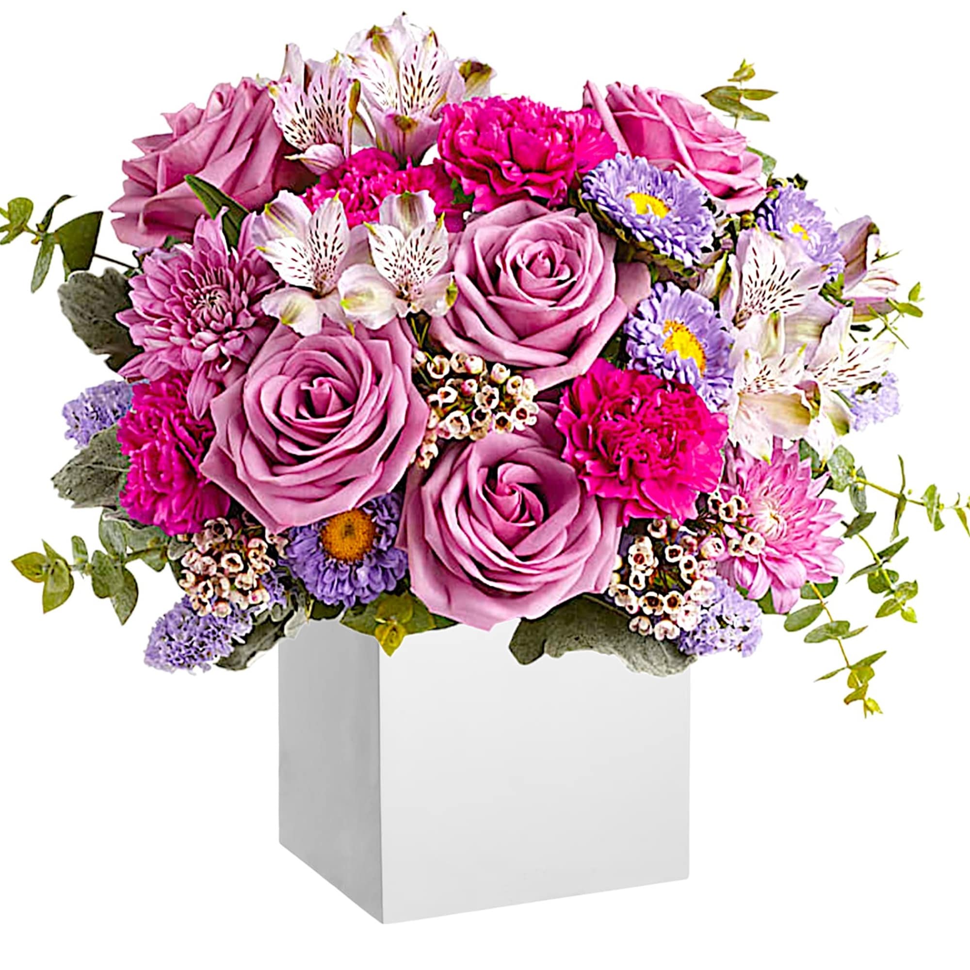 Pink and lavender bouquet in a white box vase