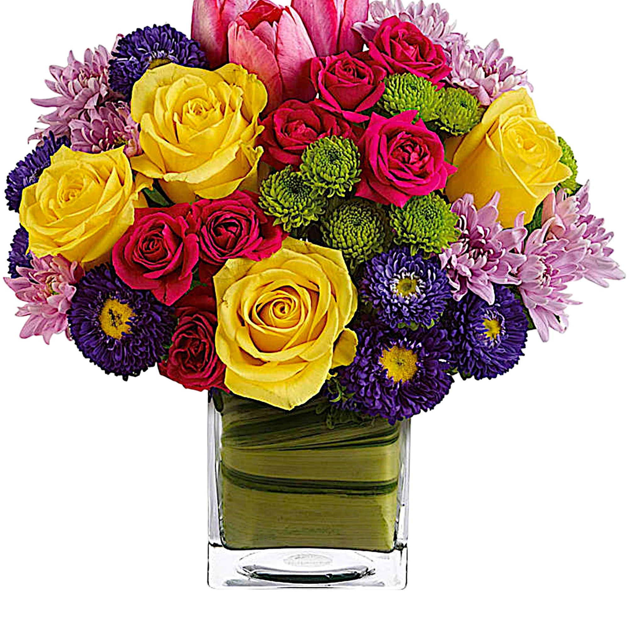 Colorful bouquet of roses, tulips, and chrysanthemums in a glass vase