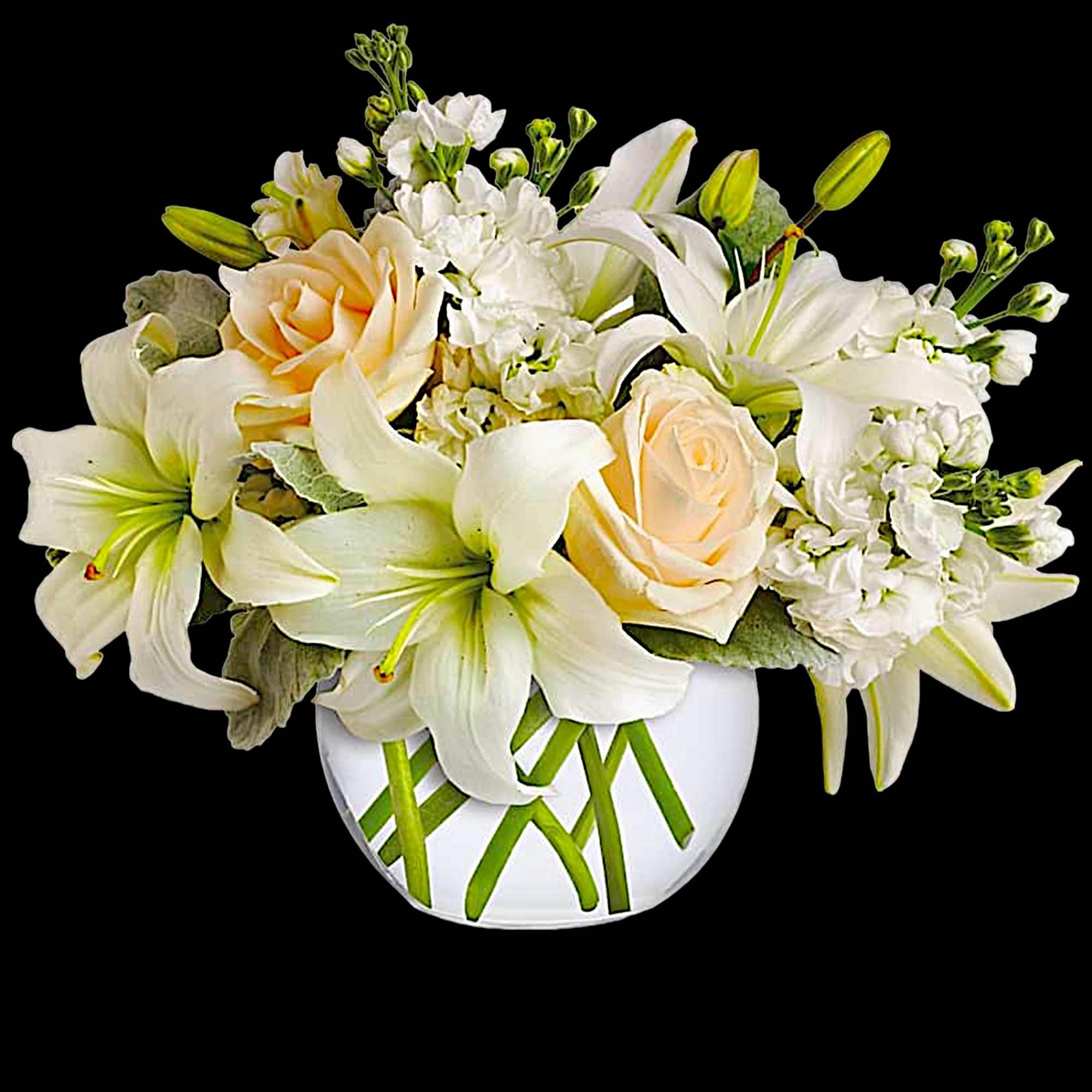 White lilies and pale roses arranged in a white vase