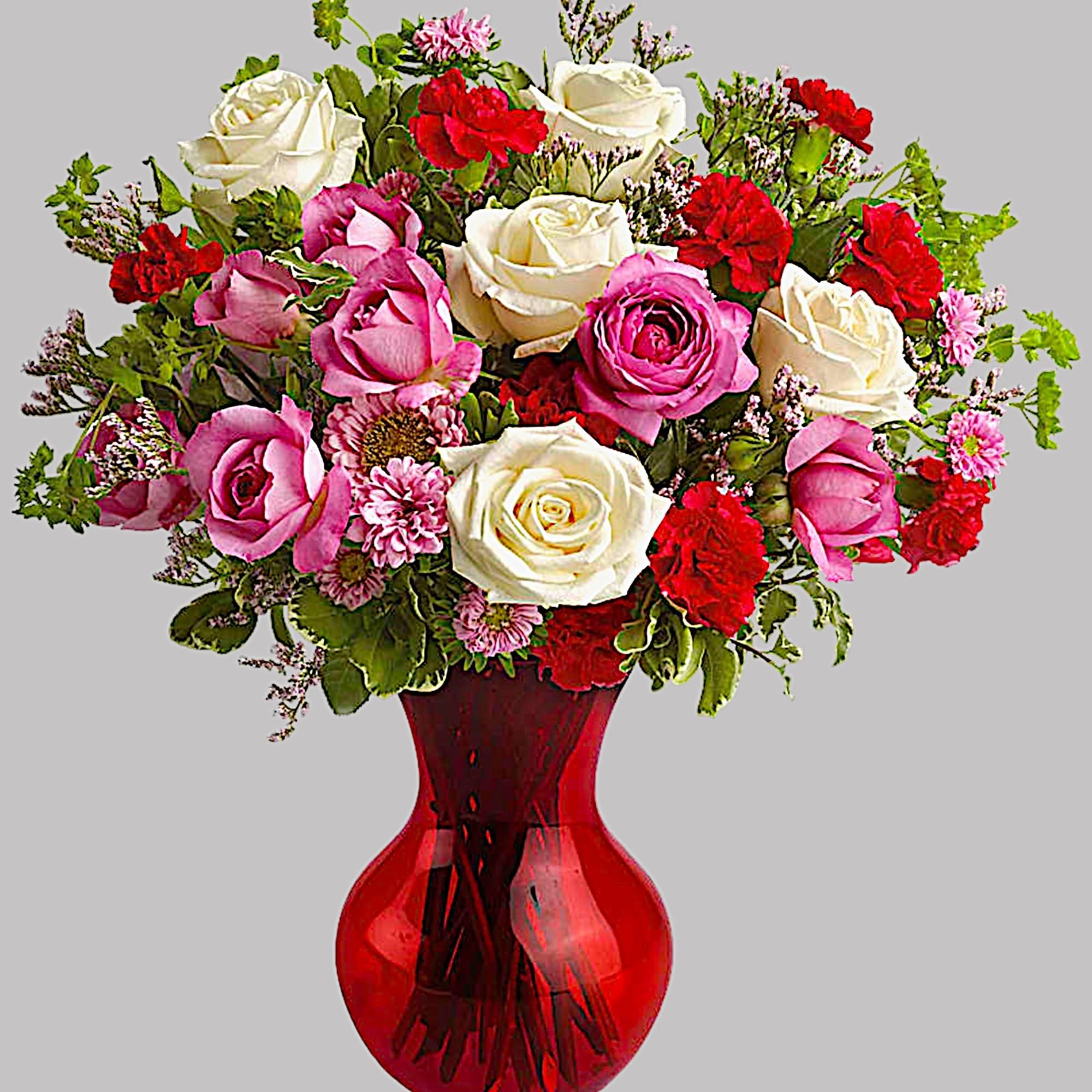 Pink and white roses with red carnations in a red glass vase, photo 4 of 4
