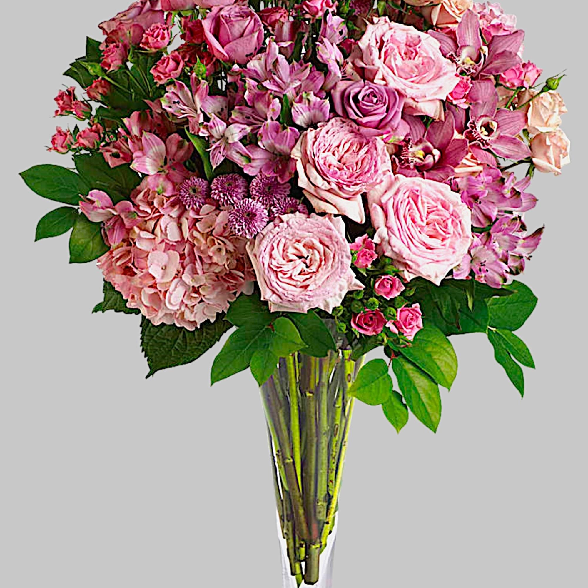 Pink rose bouquet in a clear glass vase