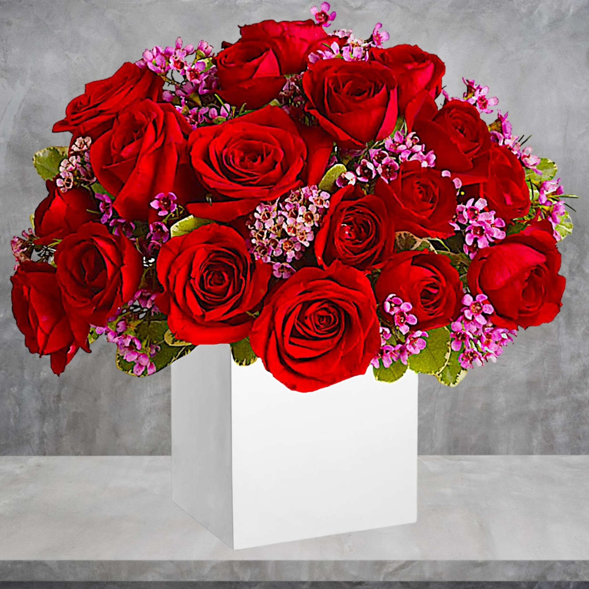 Red roses with pink filler flowers in a white box vase, photo 2 of 4