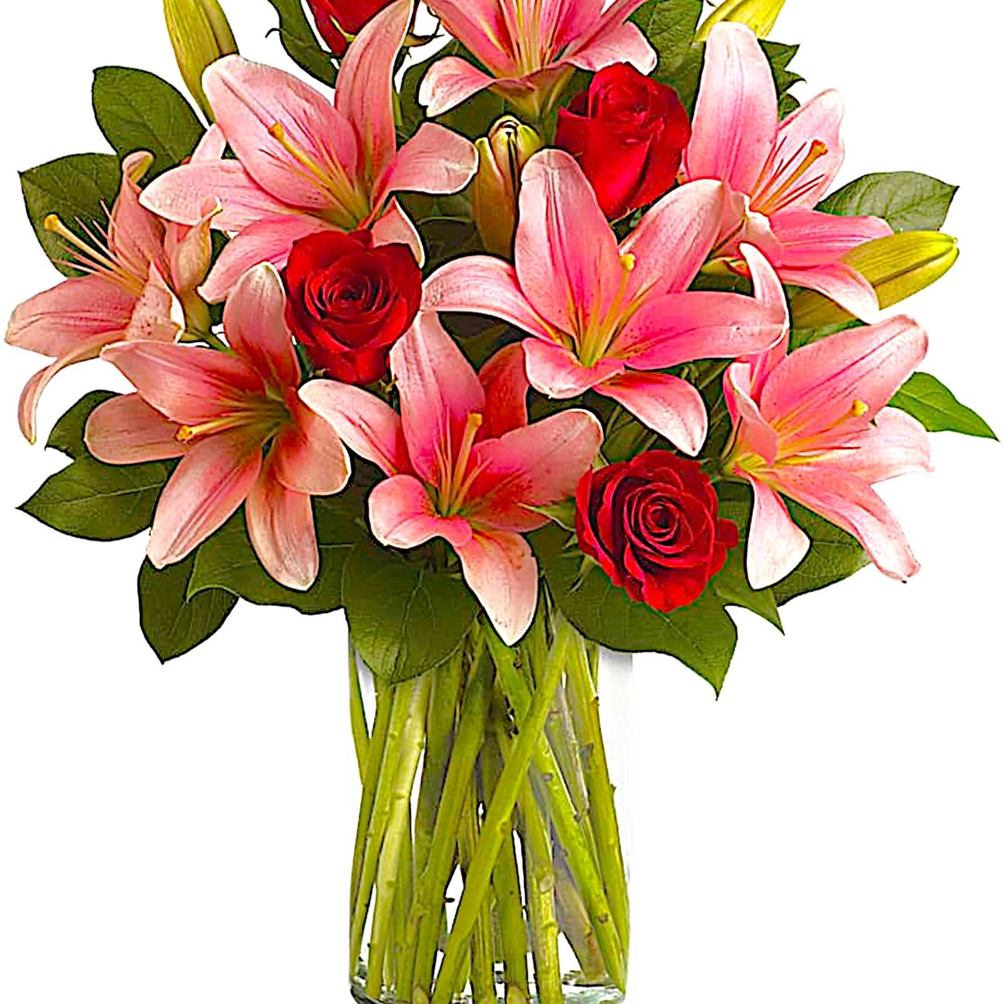 Pink lilies and red roses in a clear glass vase