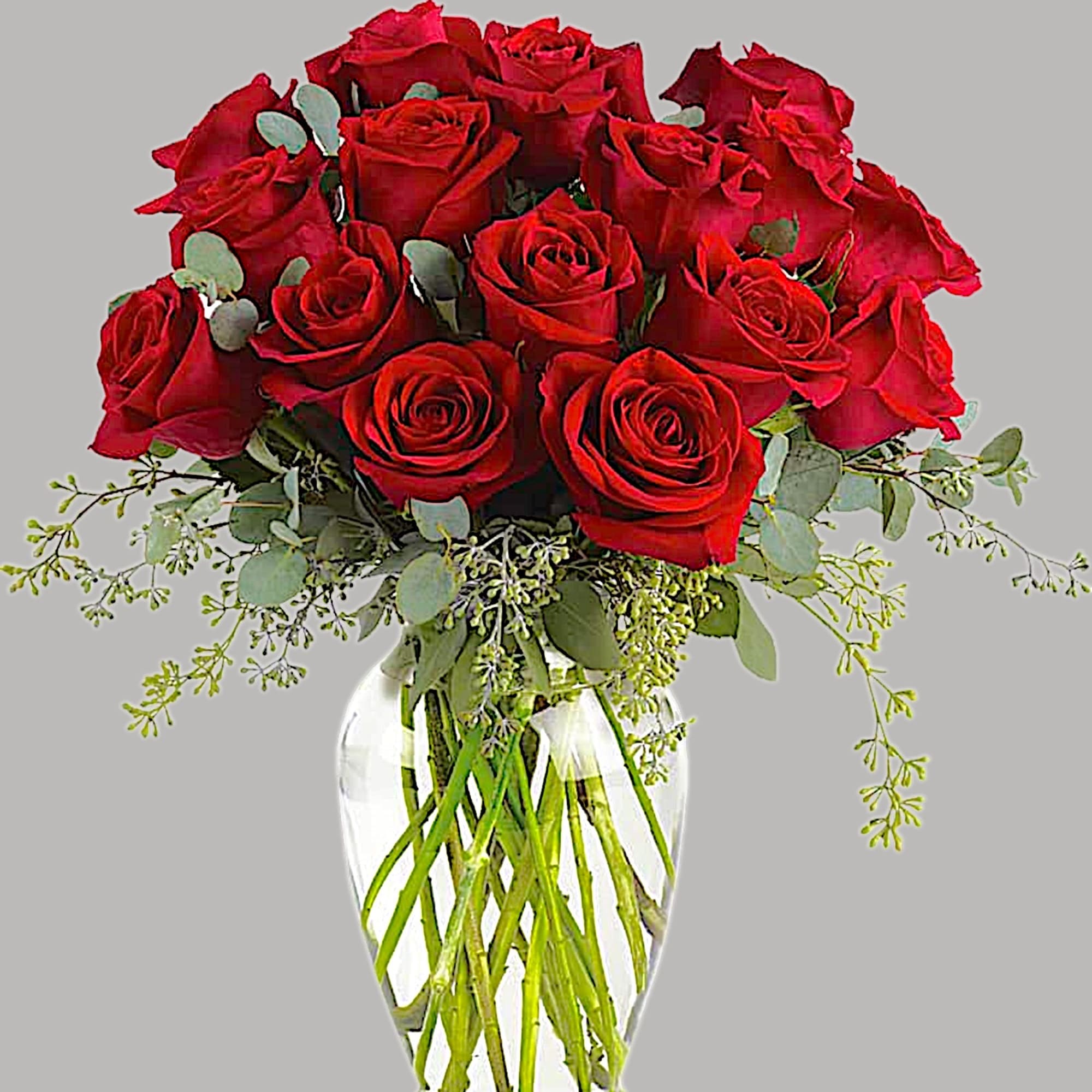 Bouquet of red roses in a clear glass vase, photo 5 of 5